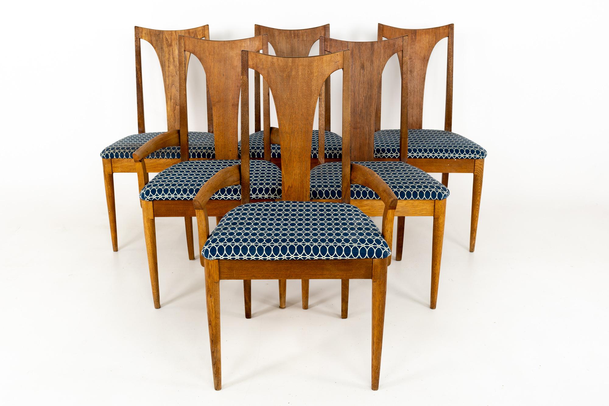 Broyhill Brasilia II midcentury walnut Brutalist dining chairs, set of 6
These chairs are 22.75 wide x 21 deep x 37 inches high, with a seat height of 18.25 and an arm height of 22.5 inches

This set is available in what we call restored vintage
