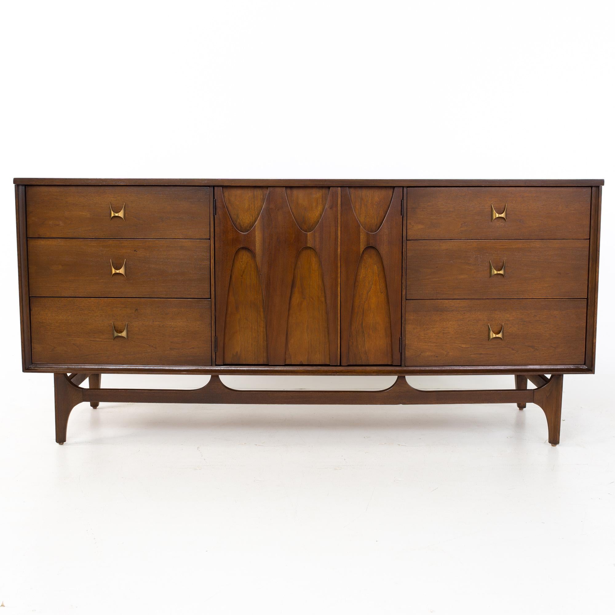 Broyhill Brasilia mid century 9 drawer lowboy dresser
Dresser measures: 66 wide x 19 deep x 31 inches high

All pieces of furniture can be had in what we call restored vintage condition. That means the piece is restored upon purchase so it’s free