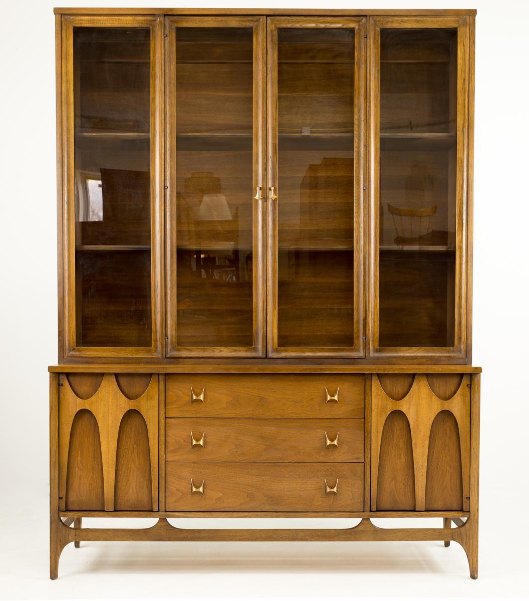 Broyhill Brasilia mid century buffet and hutch

This piece is 56.25 wide x 17 deep x 75 inches high

The credenza measures 56.25 wide x 17 deep x 28 inches high

The hutch measures 55.75 wide x 13 deep x 47 inches high

All pieces of
