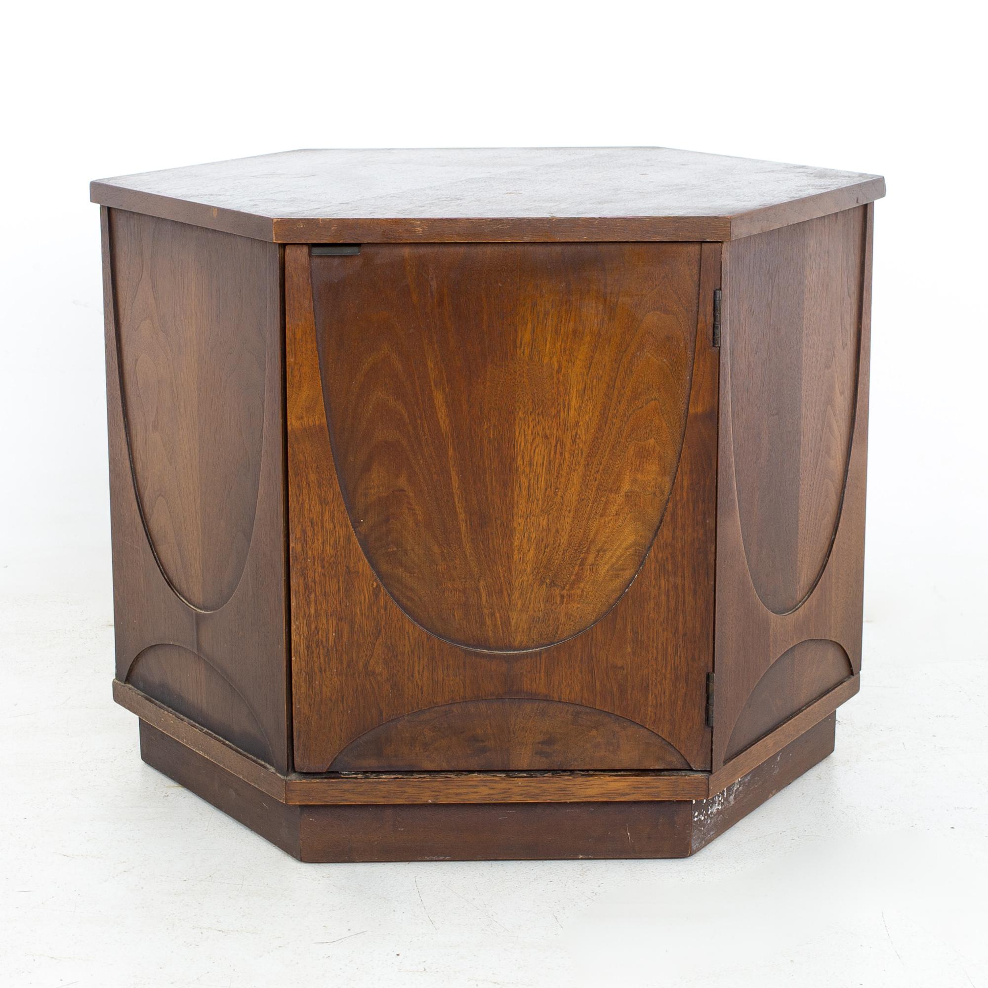 Broyhill Brasilia mid century hexagonal side end storage table
End table measures: 28 wide x 24.25 deep x 21.25 inches high

All pieces of furniture can be had in what we call restored vintage condition. That means the piece is restored upon