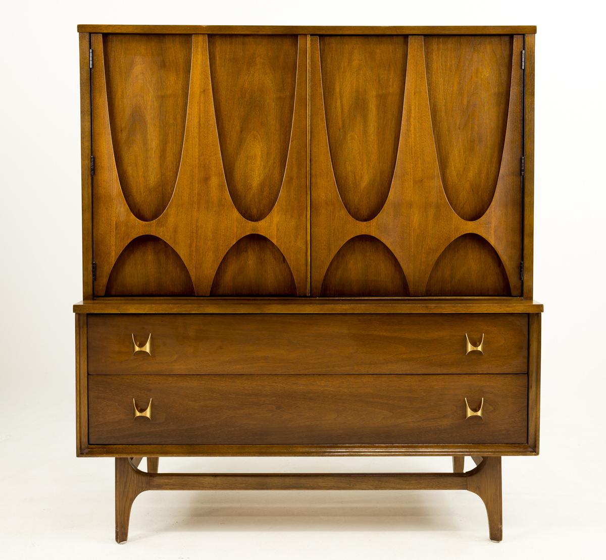 Broyhill Brasilia Mid Century Highboy Dresser Gentlemans Chest

This dresser measures: 44 wide x 19 deep x 49.75 inches high

All pieces of furniture can be had in what we call restored vintage condition. That means the piece is restored upon