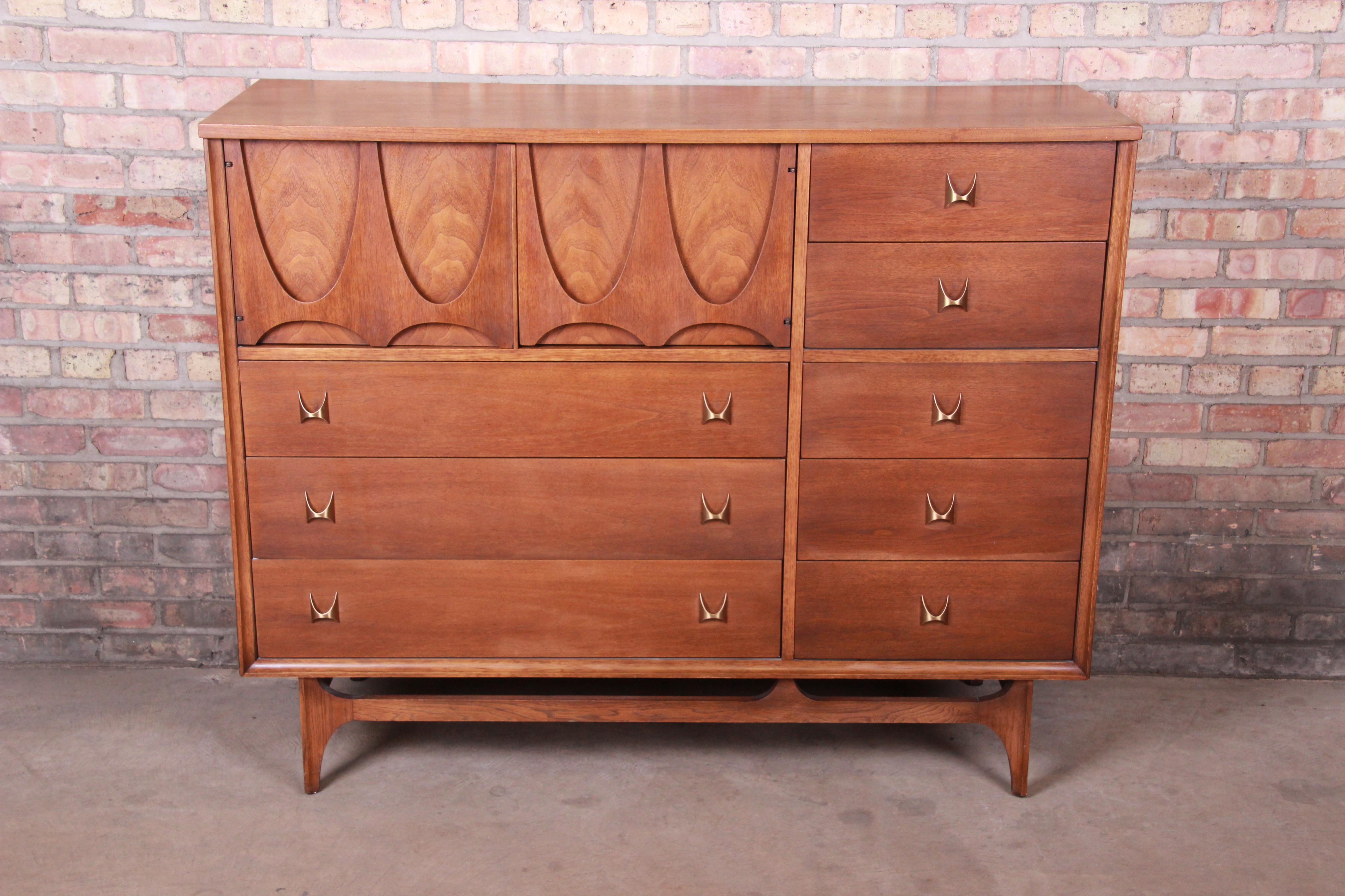 A rare and exceptional Mid-Century Modern sculpted walnut 