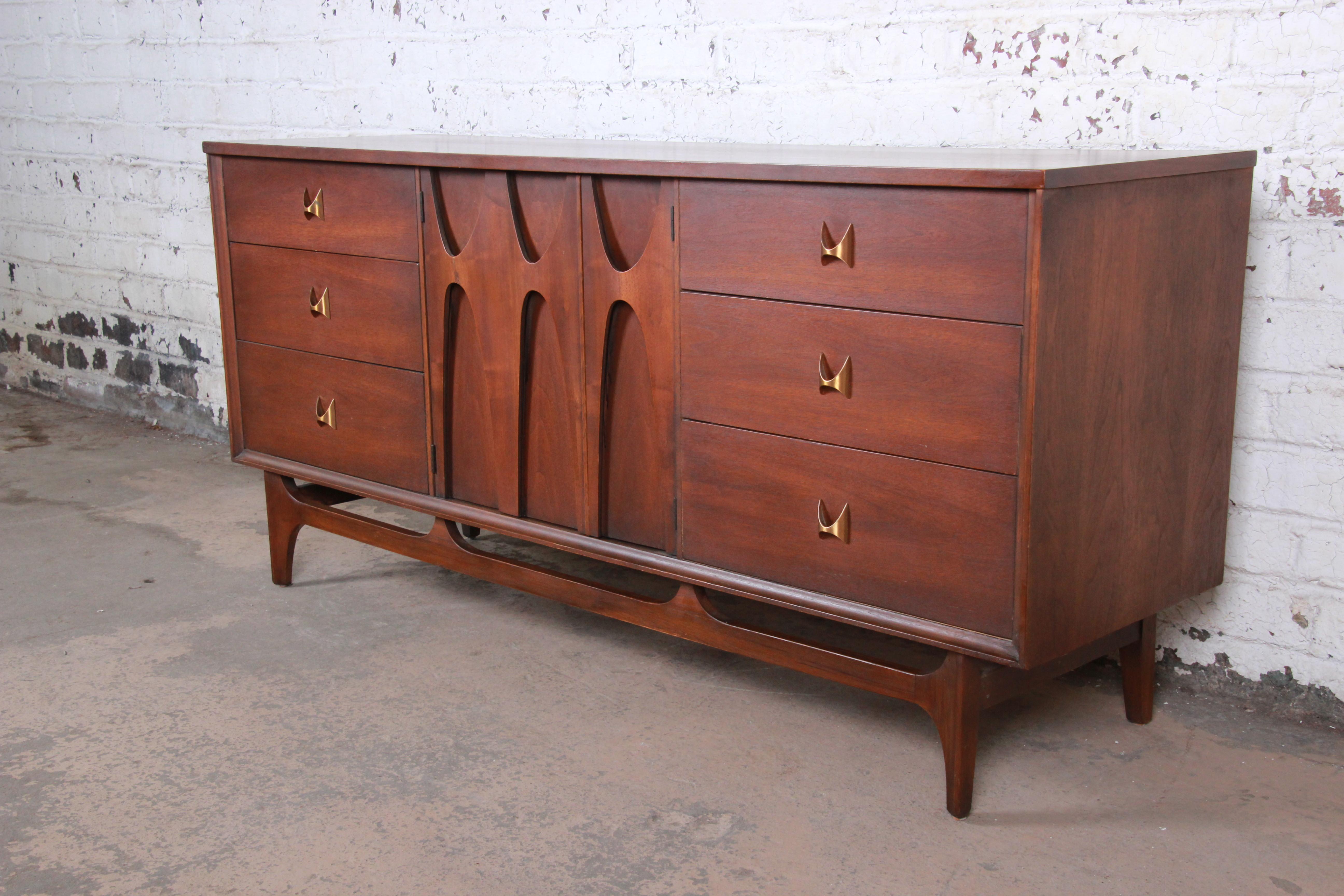 Mid-Century Modern sculpted walnut long dresser or credenza

From the 