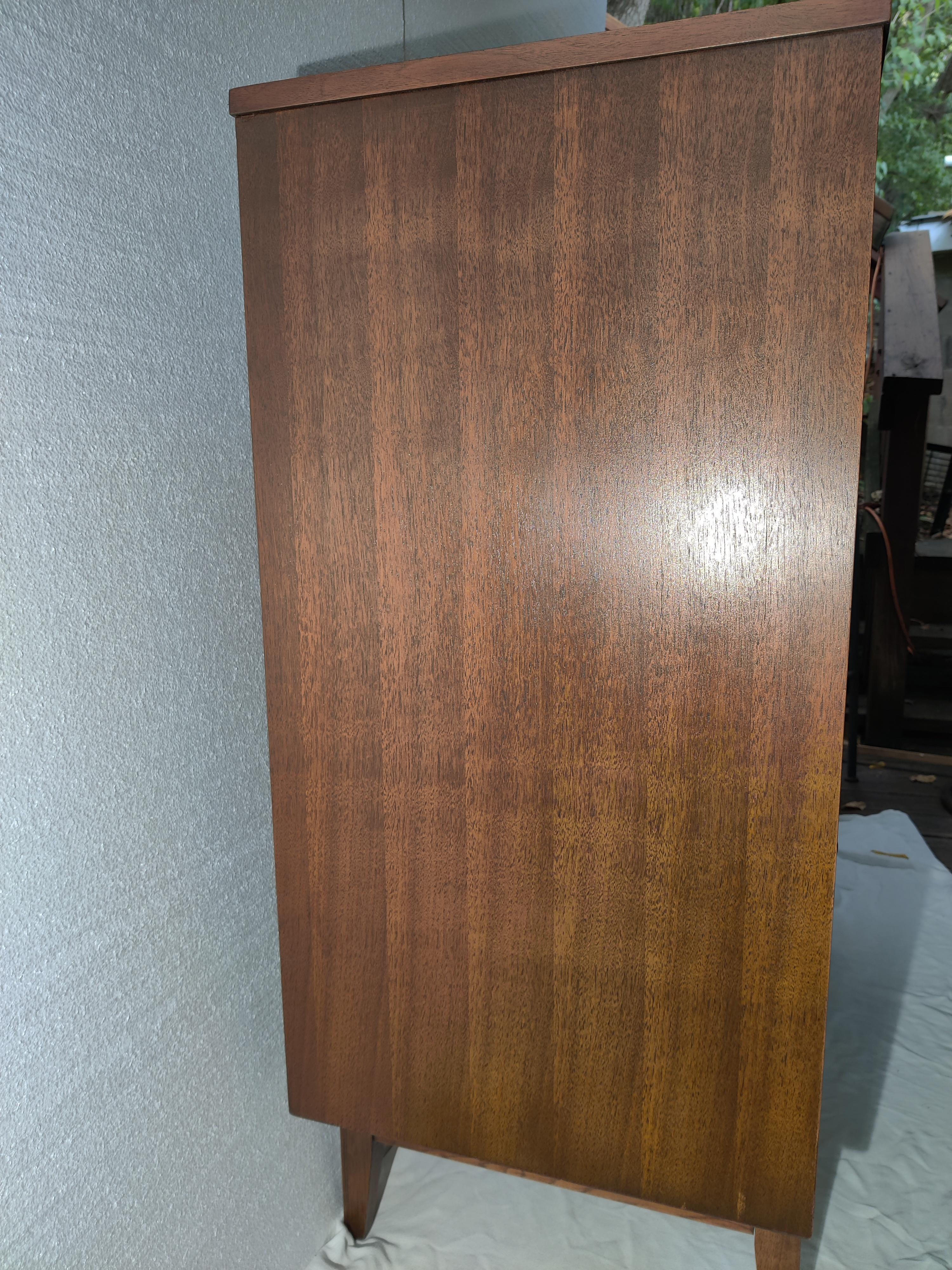 Broyhill Brasilia Mid Century Modern Tall Walnut Highboy Dresser
Hardwood and walnut veneers.
Original pulls.
Highboy is in good condition and normal ware for it's age.
Few small indentations on top rear.  See last photo.
Original finish on sides