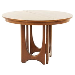 Broyhill Brasilia Table de salle à manger mi-siècle à base de piédestal en noyer avec 3 feuilles