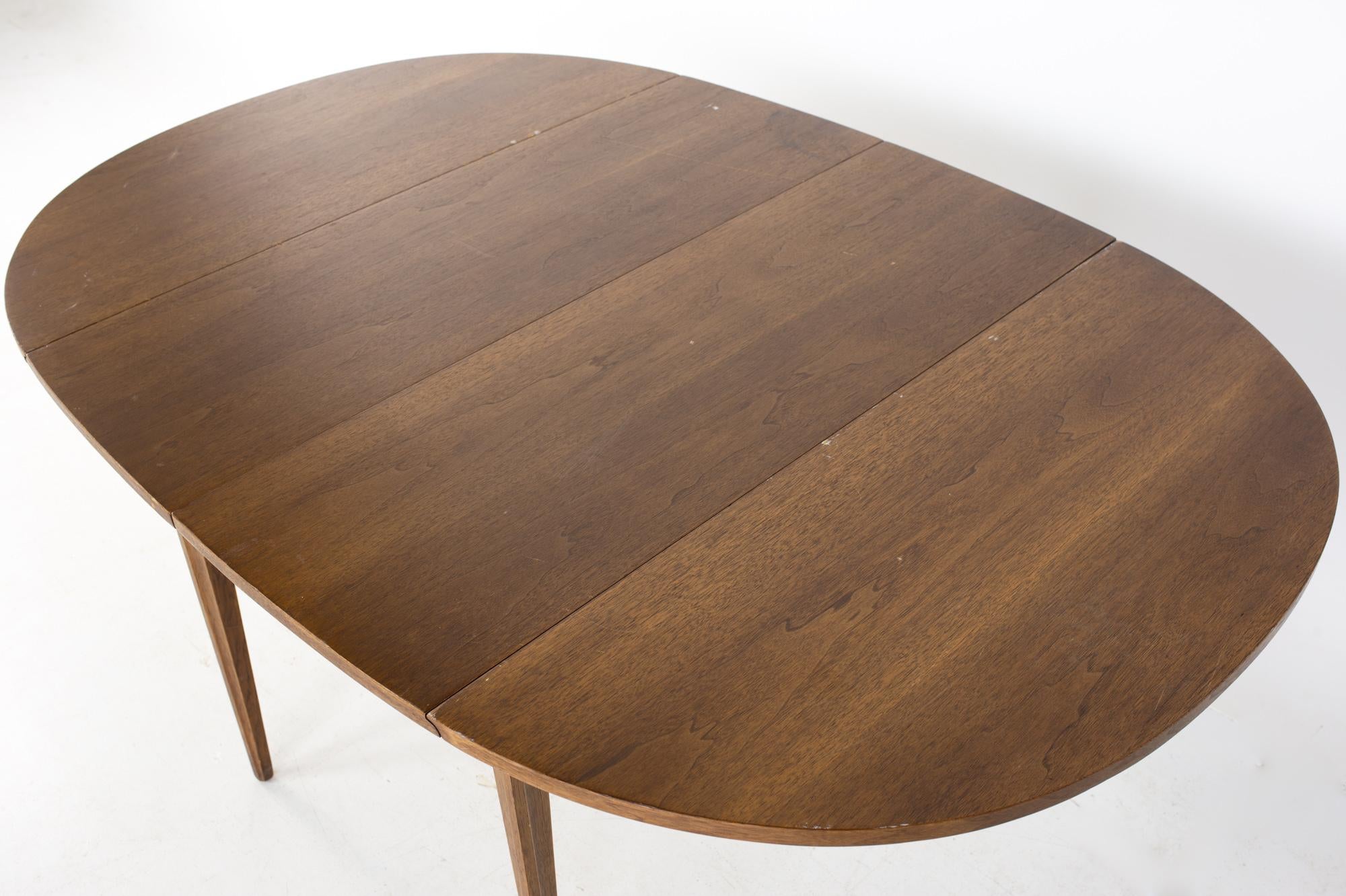 American Broyhill Brasilia Mid Century Round Walnut Drop Leaf Expanding Dining Table For Sale