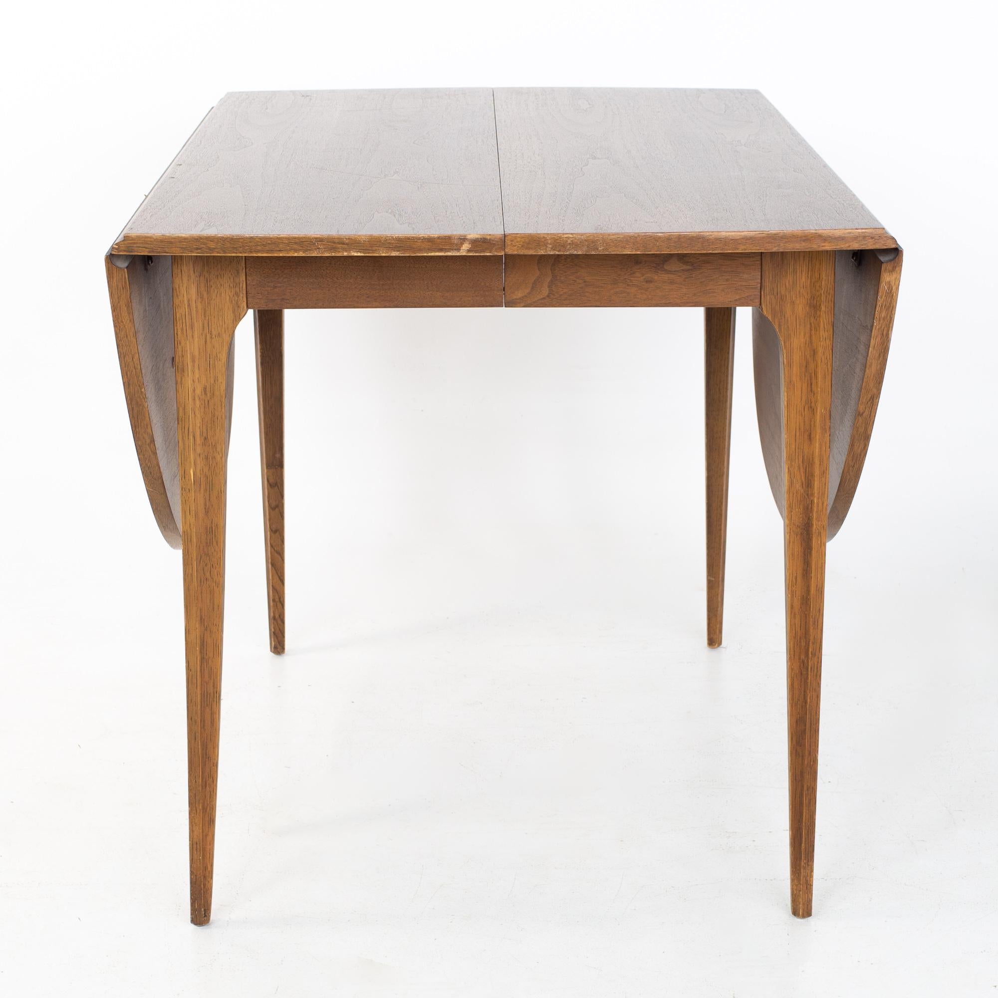 Broyhill Brasilia Mid Century Round Walnut Drop Leaf Expanding Dining Table In Good Condition For Sale In Countryside, IL