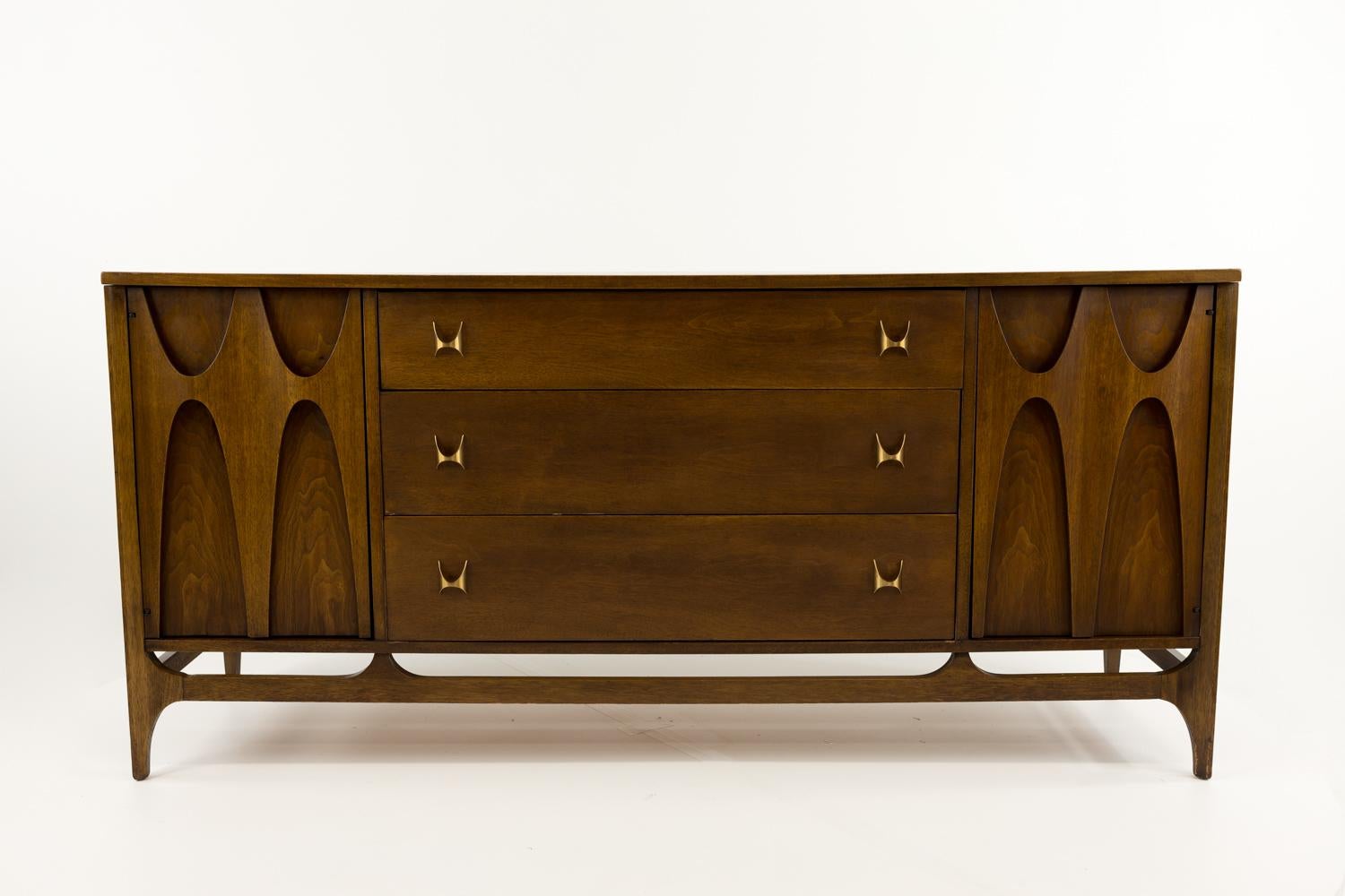 Broyhill Brasilia mid century sideboard buffet credenza
This credenza is: 66 wide x 19 deep x 30.75 inches high

All pieces of furniture can be had in what we call restored vintage condition. That means the piece is restored upon purchase so it’s