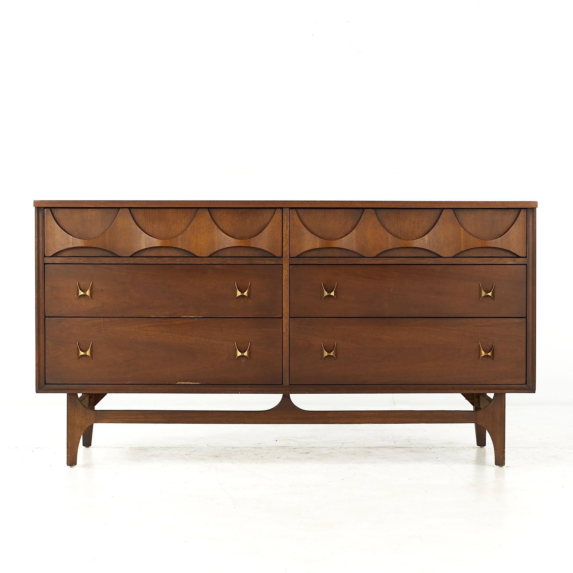 Broyhill Brasilia Mid Century walnut 6 drawer lowboy dresser

This lowboy measures: 58 wide x 19 deep x 31 inches high

All pieces of furniture can be had in what we call restored vintage condition. That means the piece is restored upon purchase