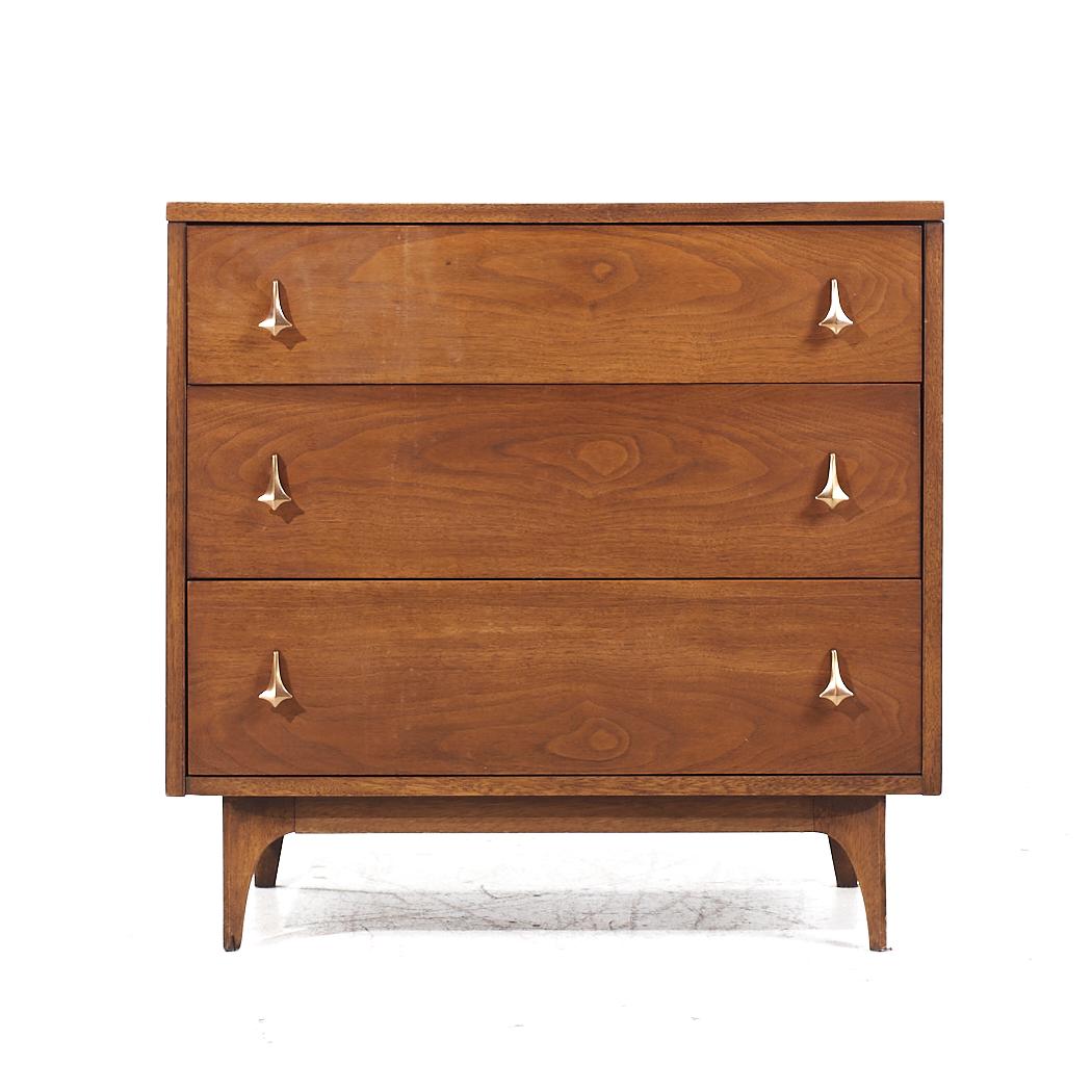 Broyhill Brasilia Mid Century Walnut and Brass 3 Drawer Lowboy Dresser

This lowboy measures: 30.75 wide x 17 deep x 29.75 inches high

All pieces of furniture can be had in what we call restored vintage condition. That means the piece is restored
