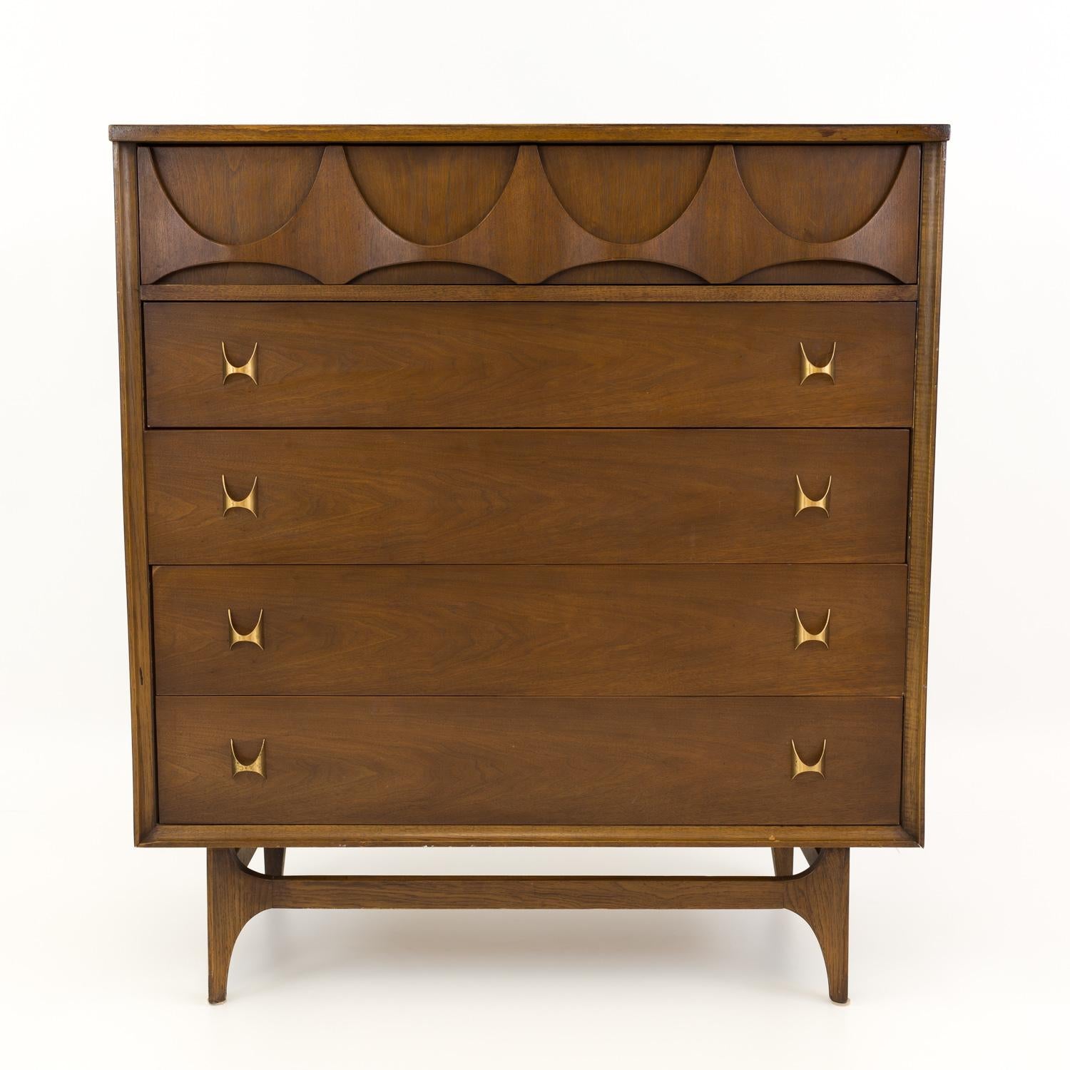 Broyhill Brasilia Mid Century Walnut and Brass 5 Drawer Highboy Dresser Chest

This dresser measures: 40 wide x 19 deep x 44.5 inches high

All pieces of furniture can be had in what we call restored vintage condition. That means the piece is