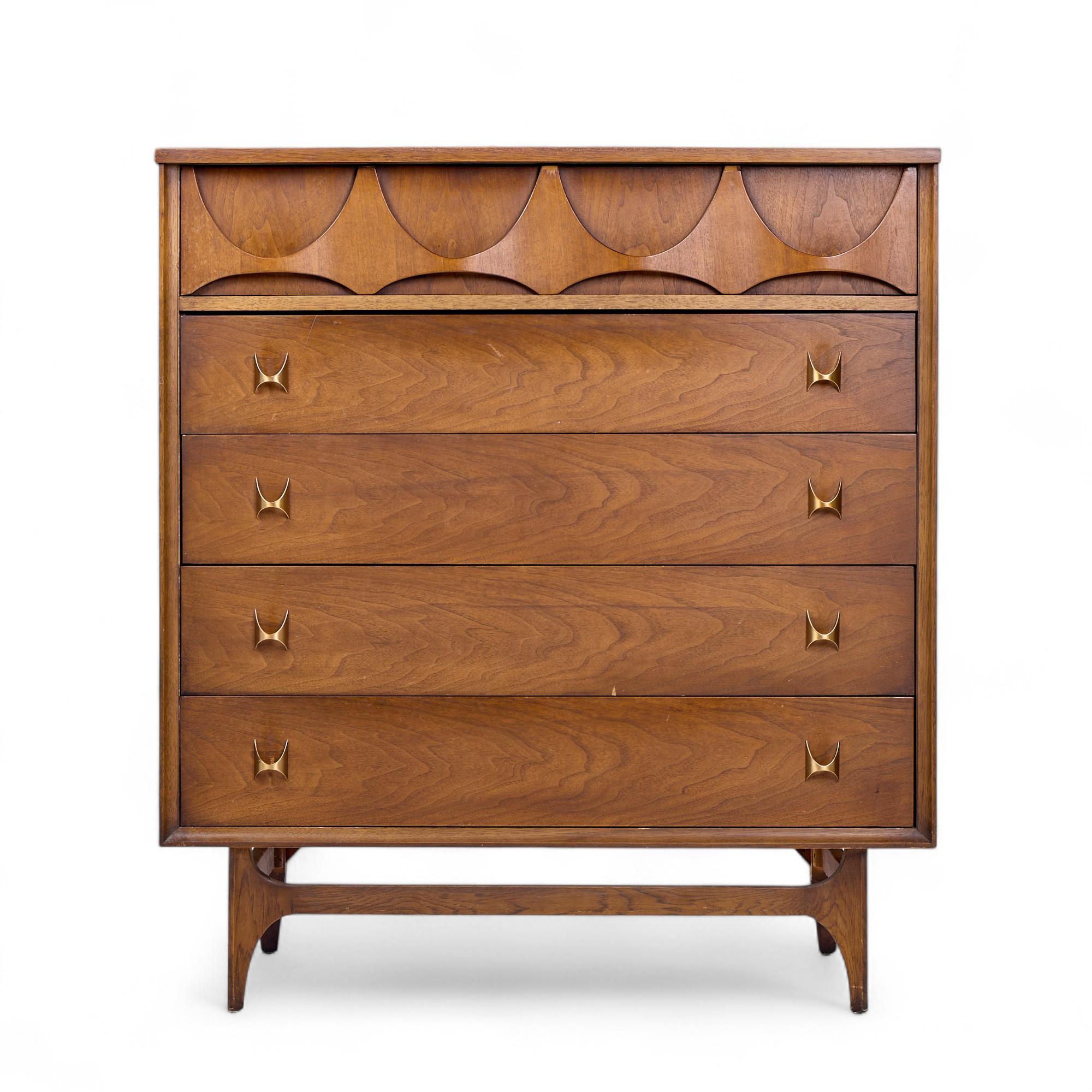 Broyhill Brasilia Mid Century Walnut and Brass Highboy Dresser

This highboy measures: 40 wide x 19 deep x 44.5 inches high

All pieces of furniture can be had in what we call restored vintage condition. That means the piece is restored upon