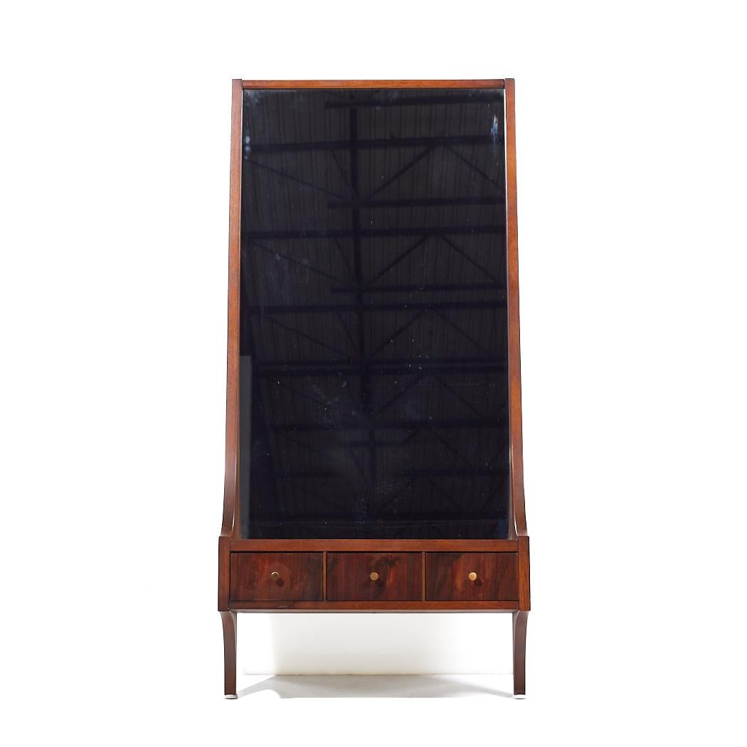 Broyhill Brasilia Mid Century Walnut and Brass Wall Mirror with Drawers

This mirror measures: 21 wide x 7.25 deep x 44.5 inches high

All pieces of furniture can be had in what we call restored vintage condition. That means the piece is restored