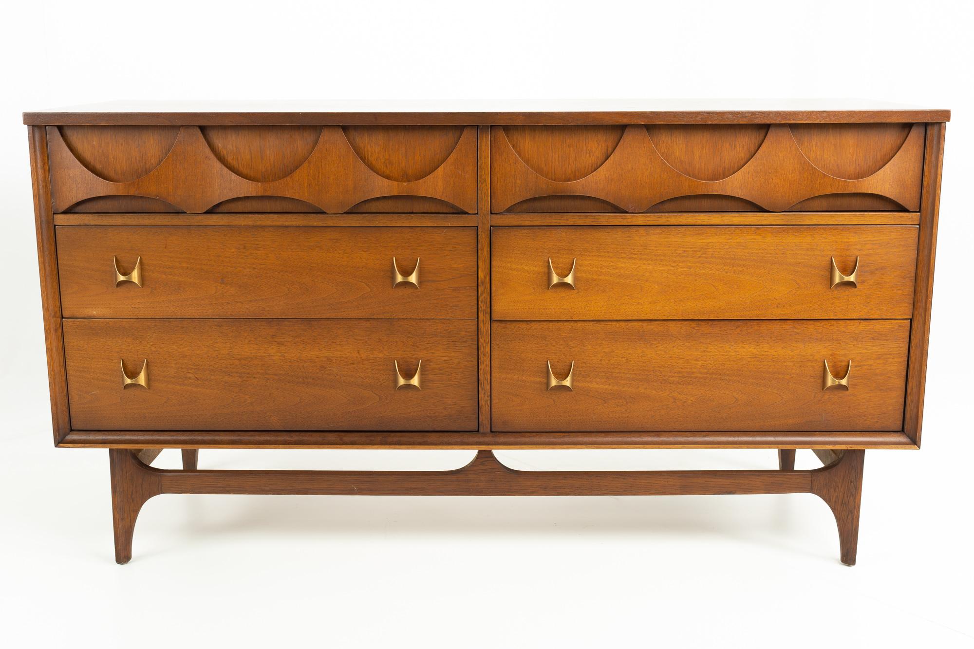 Broyhill Brasilia mid century walnut & brass 6 drawer lowboy dresser
This dresser measures: 58 wide x 19 deep x 30.5 inches high

All pieces of furniture can be had in what we call restored vintage condition. That means the piece is restored upon