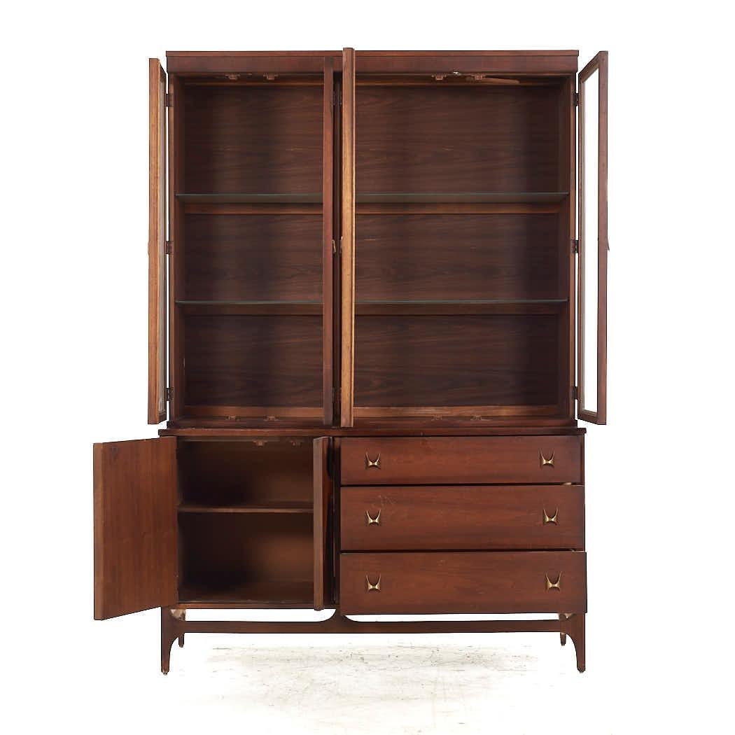 Broyhill Brasilia Mid Century Walnut Buffet and Hutch

The buffet measures: 54 wide x 19 deep x 31.25 inches high
The hutch measures: 53.75 wide x 13 deep x 48.75 inches high
The combined height of the buffet and hutch is 80 inches

All pieces of