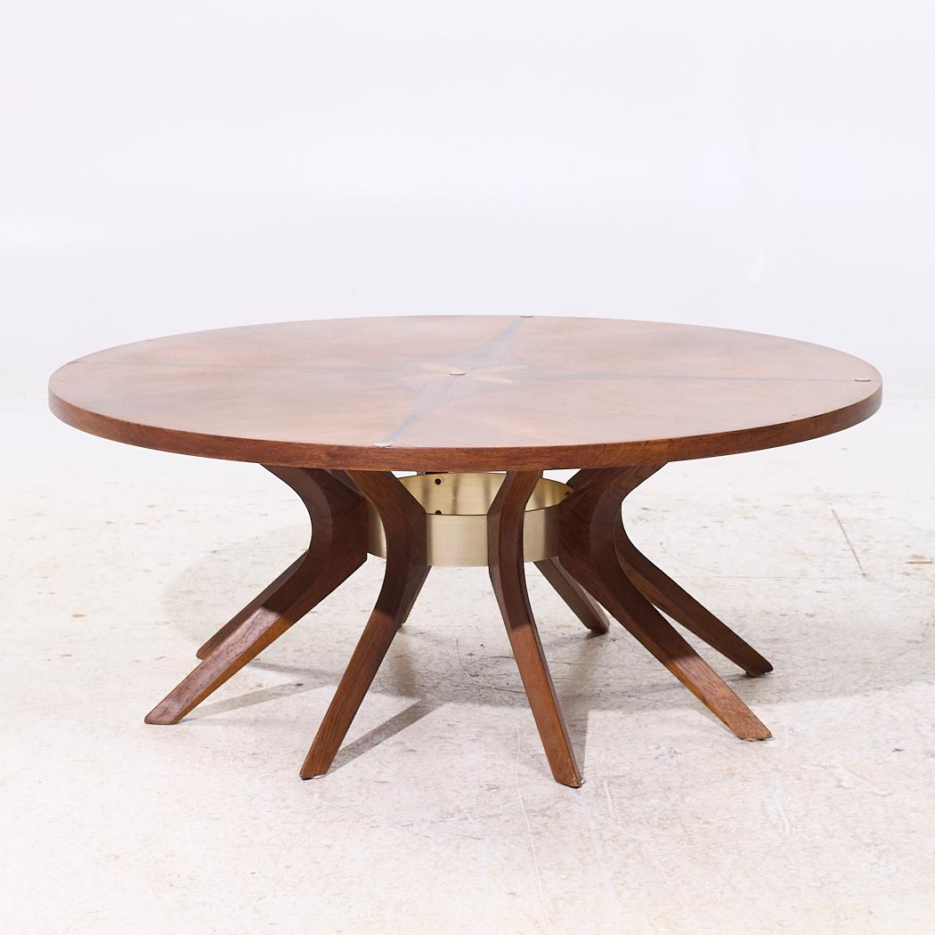 Broyhill Brasilia Mid Century Walnut Cathedral Coffee Table

This coffee table measures: 40 wide x 40 deep x 16.25 inches high

All pieces of furniture can be had in what we call restored vintage condition. That means the piece is restored upon