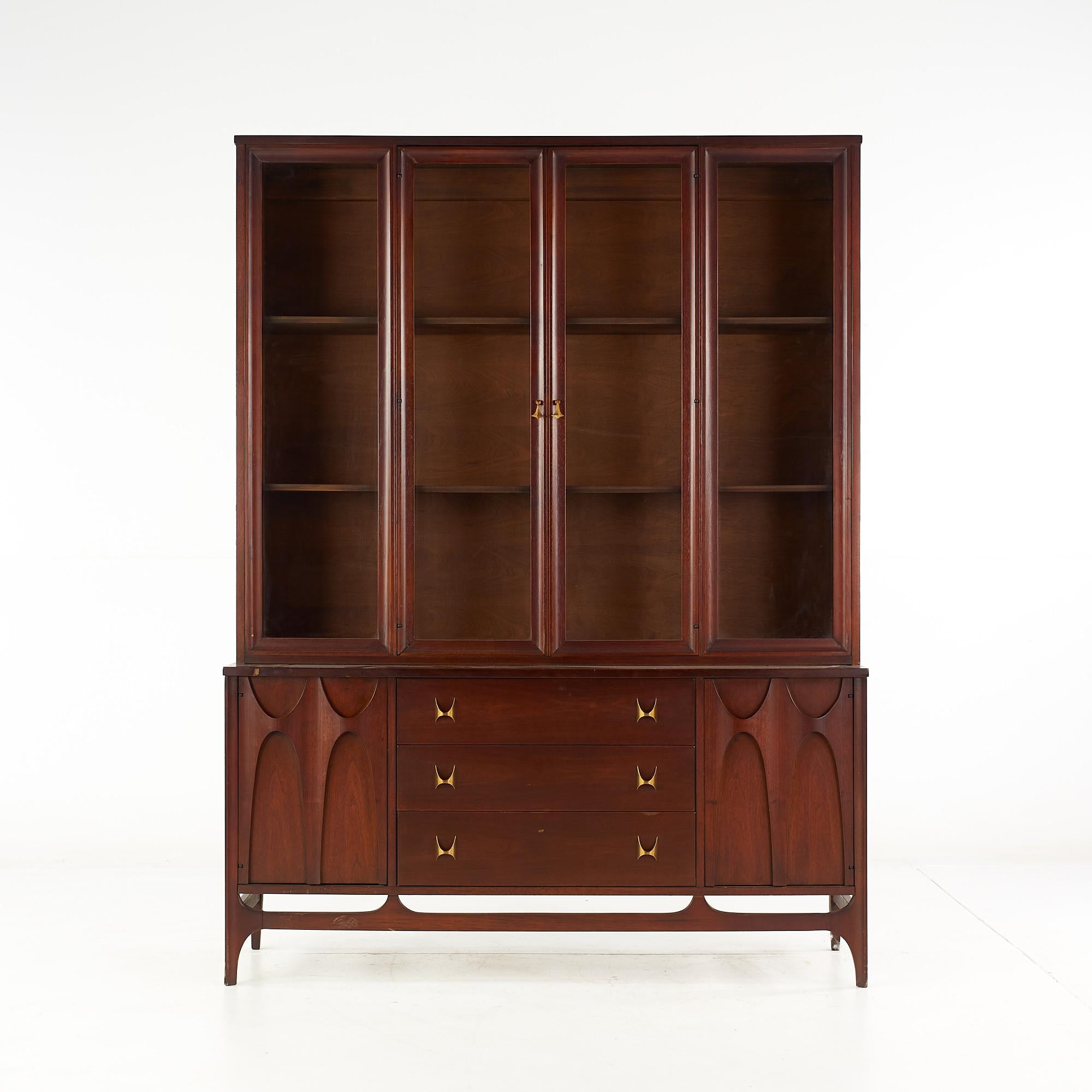 Broyhill Brasilia Mid Century Walnut China cabinet buffet and hutch

The buffet measures: 56 wide x 17 deep x 28 inches high
The hutch measures: 55 wide x 13 deep x 47 inches high
The combined height of the buffet and hutch is 75 inches

All