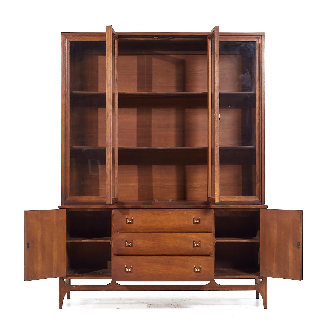 Broyhill Brasilia Mid Century Walnut Credenza and Hutch

The credenza measures: 56 wide x 17 deep x 27.75 inches high
The hutch measures: 55.5 wide x 13 deep x 47 inches high
The combined height of the credenza and hutch is 74.75 inches

All pieces