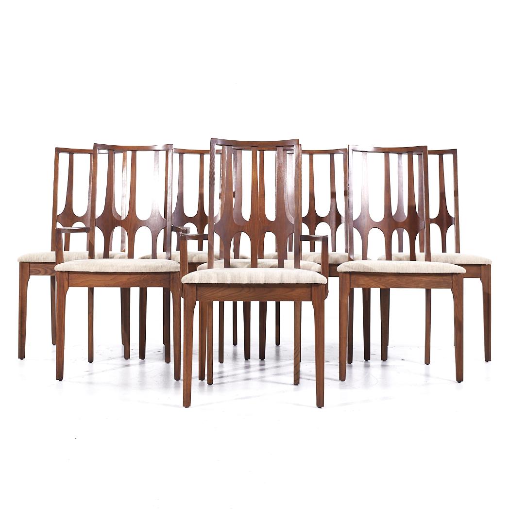 Broyhill Brasilia Mid Century Walnut Dining Chairs - Set of 8

Each armless chair measures: 20 wide x 19 deep x 38.25 high, with a seat height of 18.5 inches
Each captains chair measures: 21 wide x 19 deep x 38.25 high, with a seat height of 18.5