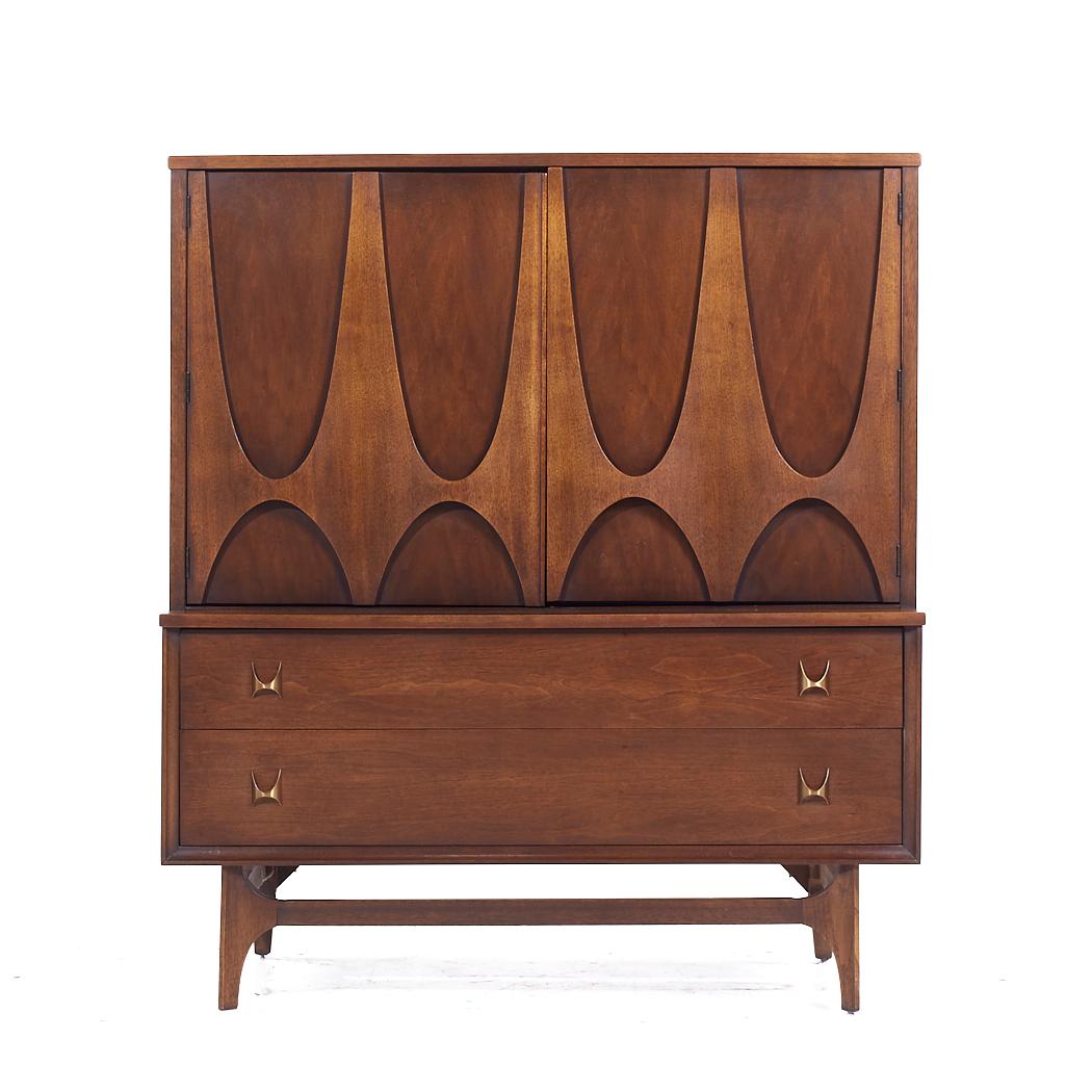 Broyhill Brasilia Mid Century Walnut Gentlemans Chest

This gentleman’s chest measures: 44 wide x 19 deep x 49.75 inches high

All pieces of furniture can be had in what we call restored vintage condition. That means the piece is restored upon