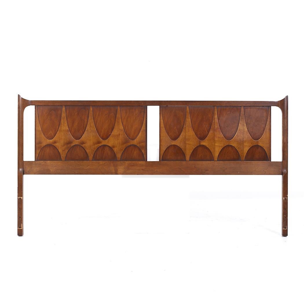 Broyhill Brasilia Mid Century Walnut King Headboard

This headboard measures: 78 wide x 1.75 deep x 40.75 inches high

All pieces of furniture can be had in what we call restored vintage condition. That means the piece is restored upon purchase so