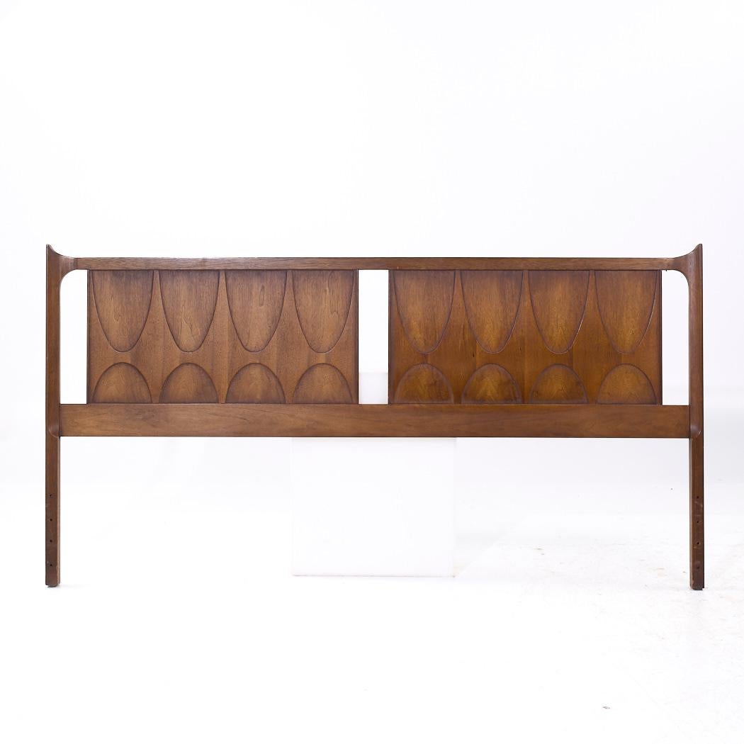 Broyhill Brasilia Mid Century Walnut King Headboard

This headboard measures: 78 wide x 1.75 deep x 40.5 inches high

All pieces of furniture can be had in what we call restored vintage condition. That means the piece is restored upon purchase so