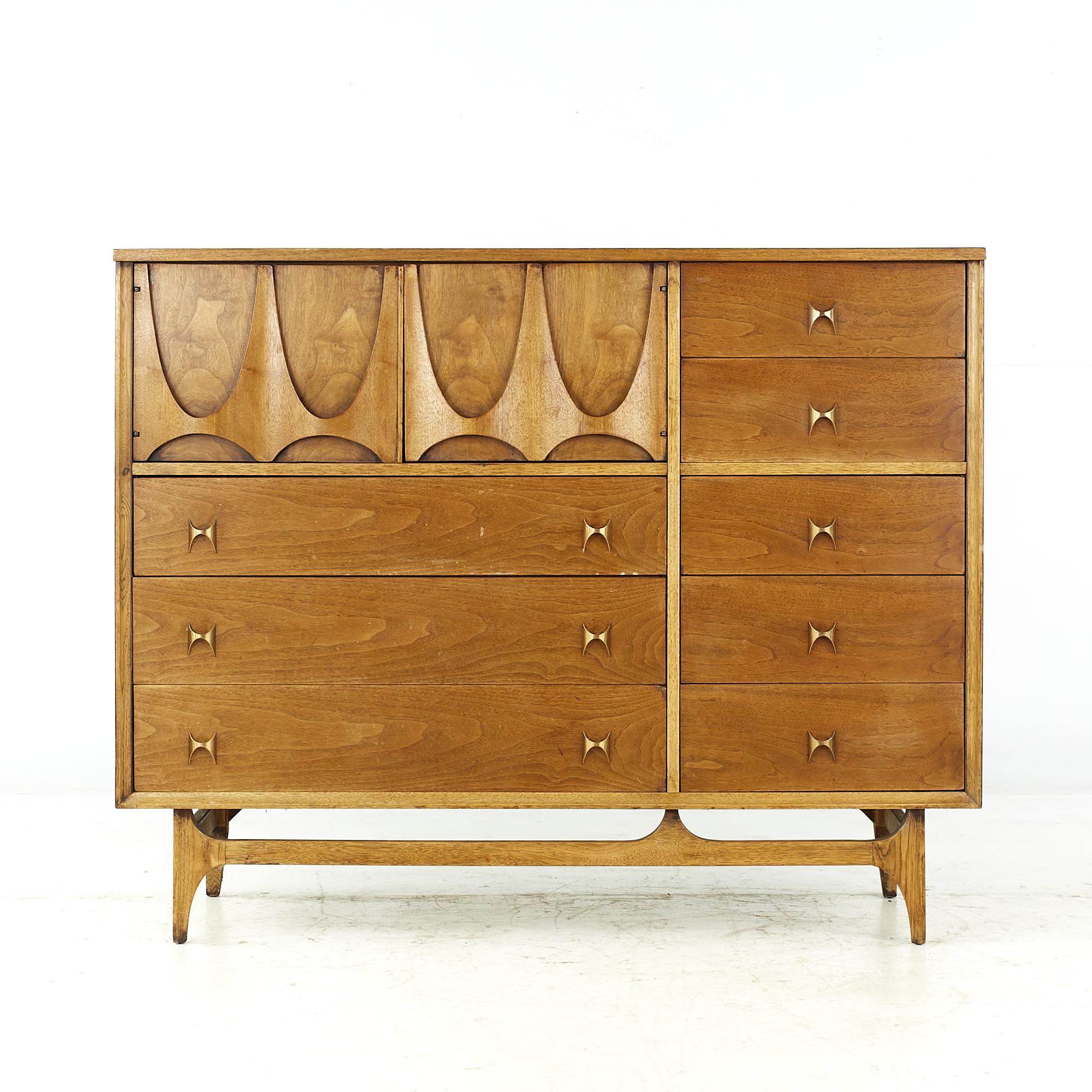 Broyhill Brasilia mid-century walnut magna chest.

This chest measures: 54 wide x 19 deep x 43.25 inches high.

All pieces of furniture can be had in what we call restored vintage condition. That means the piece is restored upon purchase so it’s
