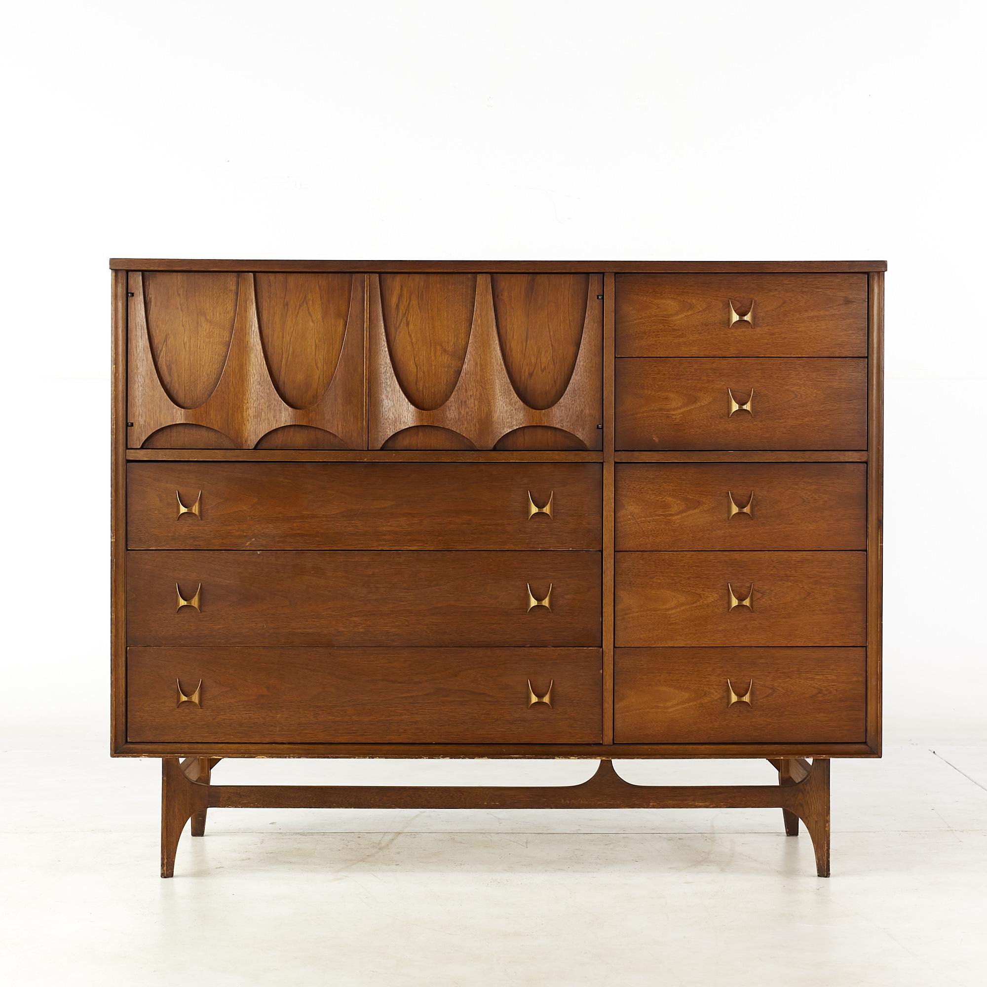 Broyhill Brasilia Mid Century Walnut magna dresser

This dresser measures: 54 wide x 19 deep x 43.25 inches high

All pieces of furniture can be had in what we call restored vintage condition. That means the piece is restored upon purchase so