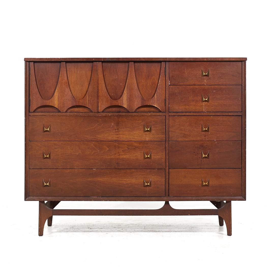 Broyhill Brasilia Mid Century Walnut Magna Highboy Dresser

This highboy measures: 54 wide x 19 deep x 43.5 inches high

All pieces of furniture can be had in what we call restored vintage condition. That means the piece is restored upon purchase so