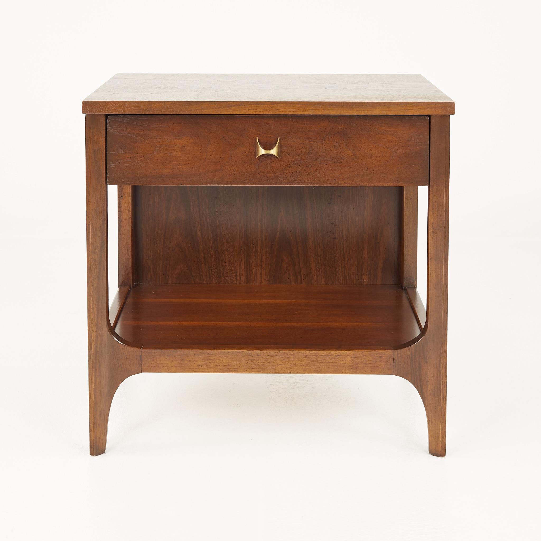 Broyhill Brasilia mid century walnut nightstand
Nightstand measures: 22.25 wide x 15 deep x 22 inches high

?All pieces of furniture can be had in what we call restored vintage condition. That means the piece is restored upon purchase so it’s