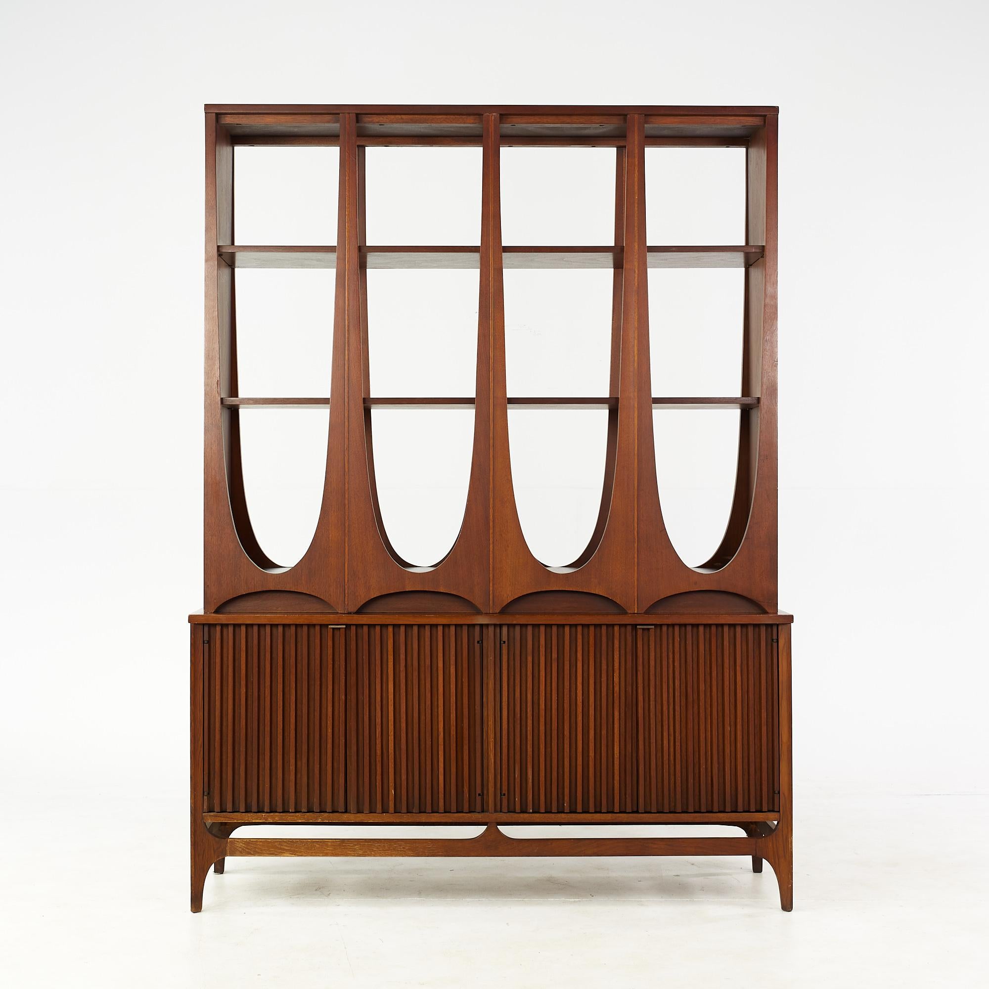 Broyhill Brasilia Mid Century Walnut Room Divider

The credenza bottom measures: 54 wide x 17 deep x 27 inches high
The top shelving measures: 52 wide x 13 deep x 46 inches high
The combined height of the room divider is 73 inches

All pieces of