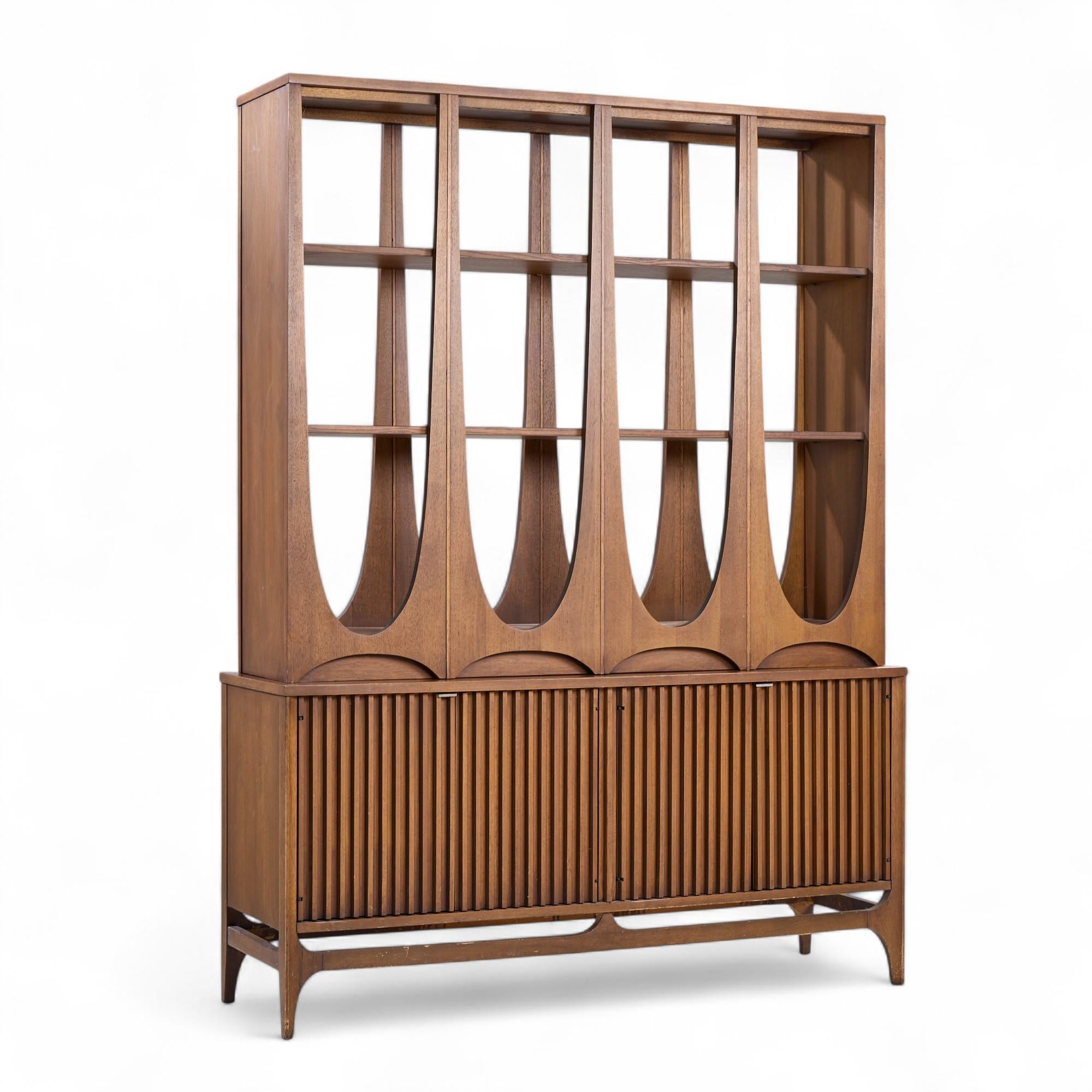Broyhill Brasilia Mid Century Walnut Room Divider

The upper of the room divider measures: 54 wide x 17 deep x 26.5 inches high
The lower of the room divider measures: 52.25 wide x 13.25 deep x 46 inches high
The combined height measures: 72.5