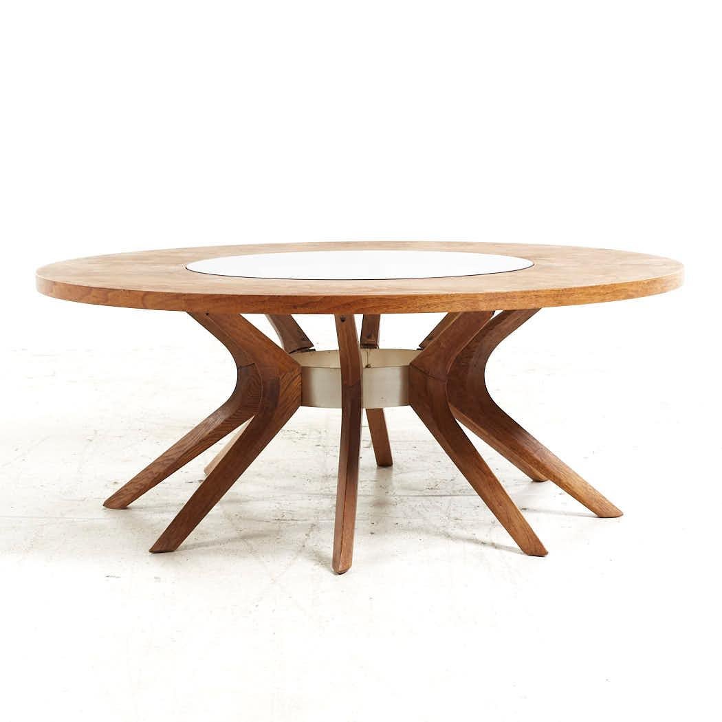 Broyhill Brasilia Mid Century Walnut Round Coffee Table

This coffee table measures: 40 wide x 40 deep x 16 inches high

All pieces of furniture can be had in what we call restored vintage condition. That means the piece is restored upon purchase so