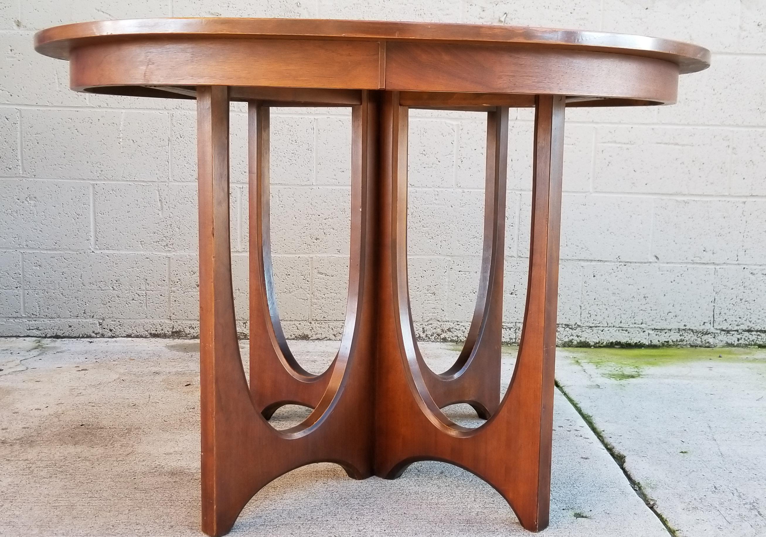 A Mid-Century Modern sculptural dining table by Broyhill Furniture. One of their most sought after lines 