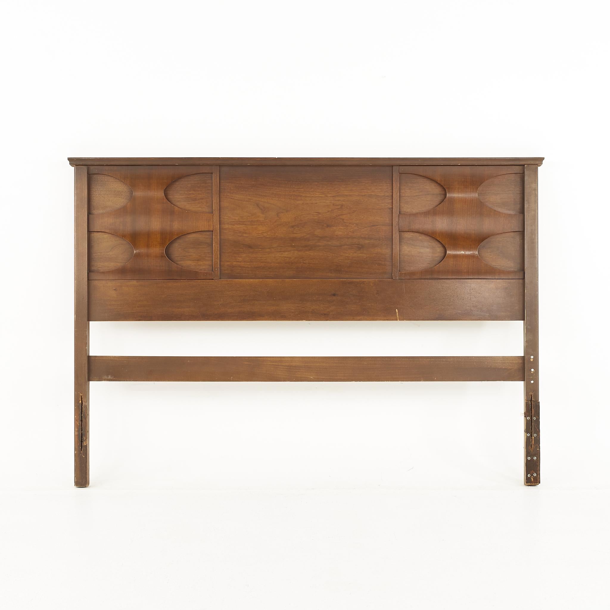 Broyhill Brasilia style Brutalist mid-century walnut full headboard

The headboard measures: 56.5 wide x 2 deep x 39.5 inches high

All pieces of furniture can be had in what we call restored vintage condition. That means the piece is restored