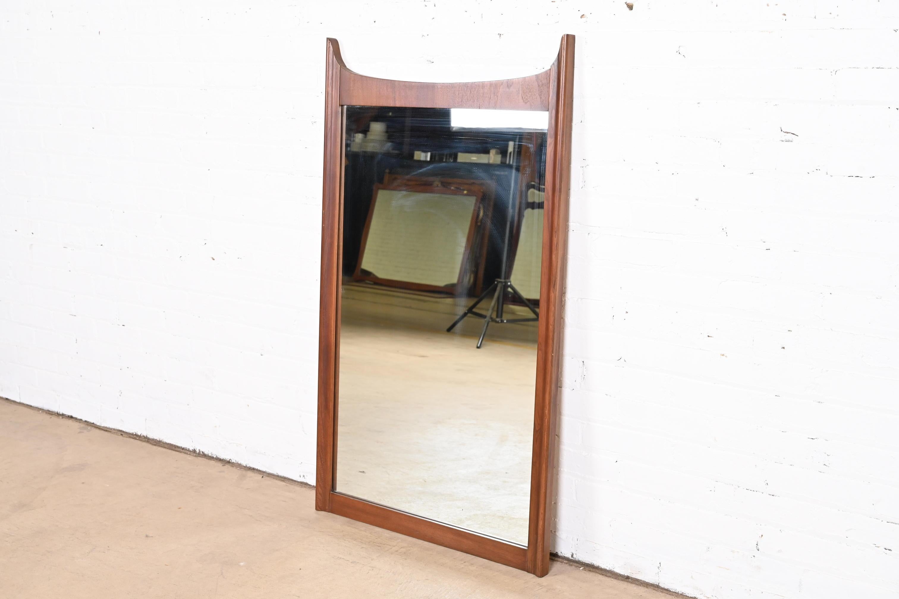 American Broyhill Brasilia Style Mid-Century Modern Sculpted Walnut Framed Wall Mirror For Sale
