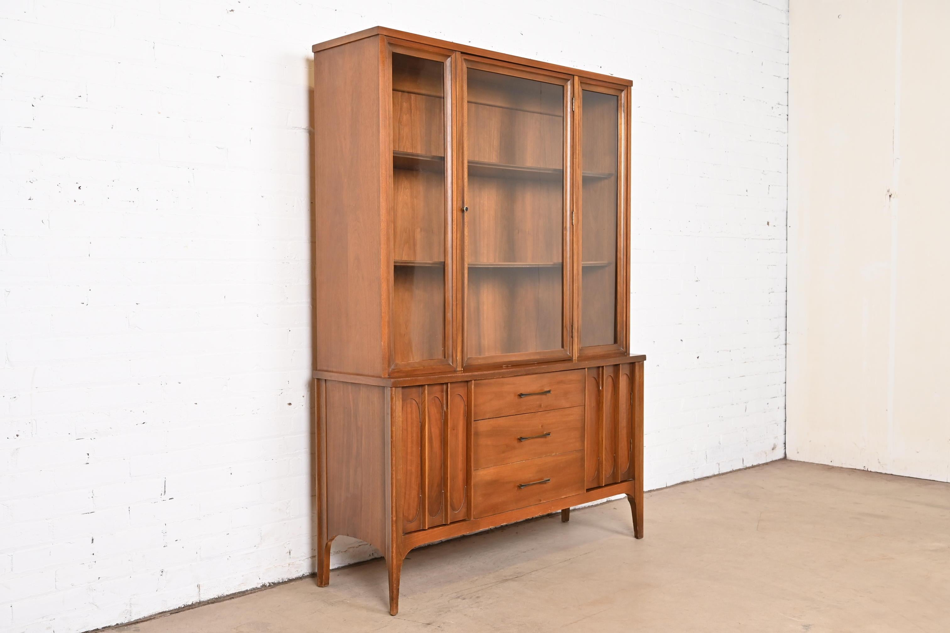 Mid-20th Century Broyhill Brasilia Style Sculpted Walnut Breakfront Bookcase or China Cabinet