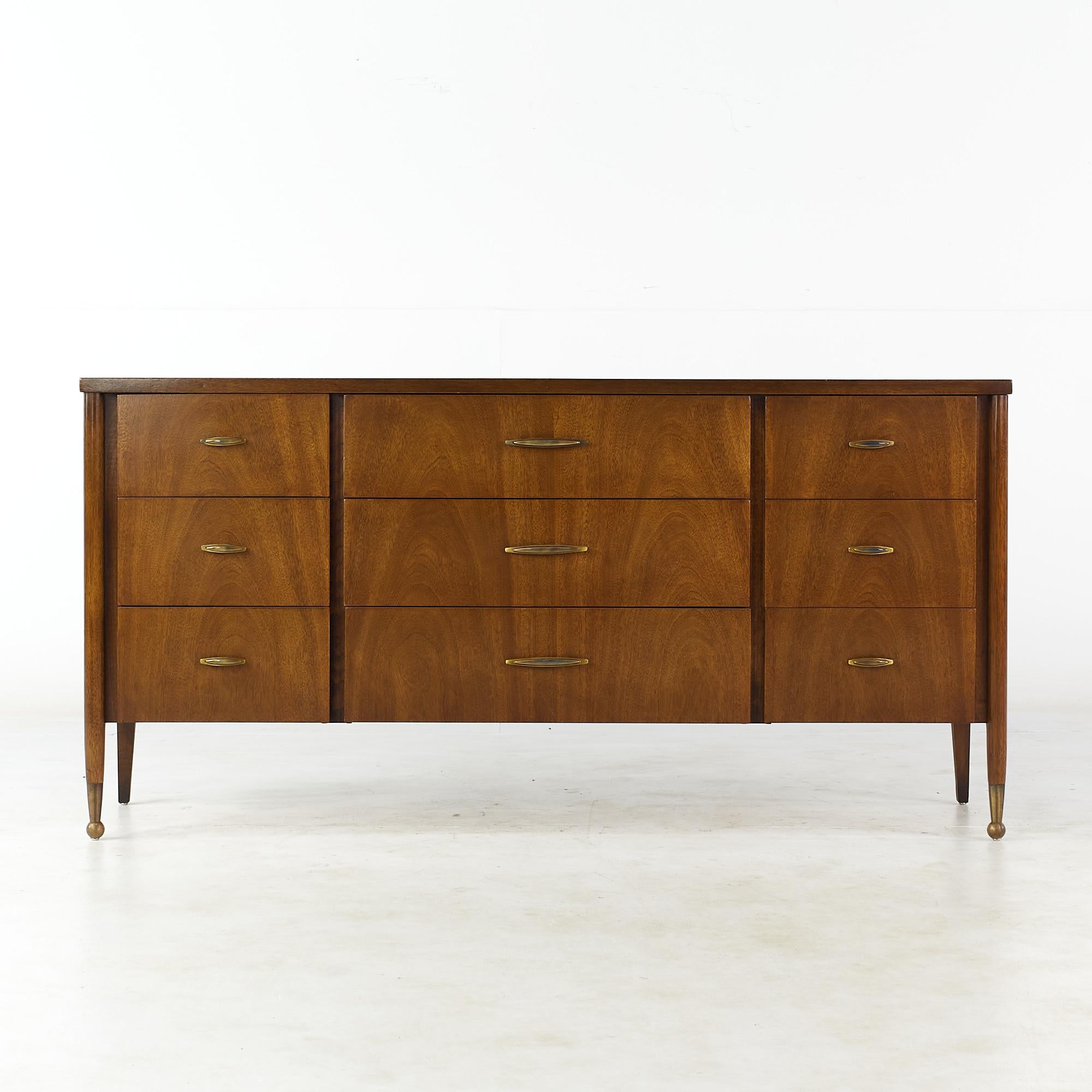 Broyhill Cerama mid century brass and walnut lowboy dresser

This dresser measures: 62 wide x 18 deep x 31 inches high

All pieces of furniture can be had in what we call restored vintage condition. That means the piece is restored upon purchase
