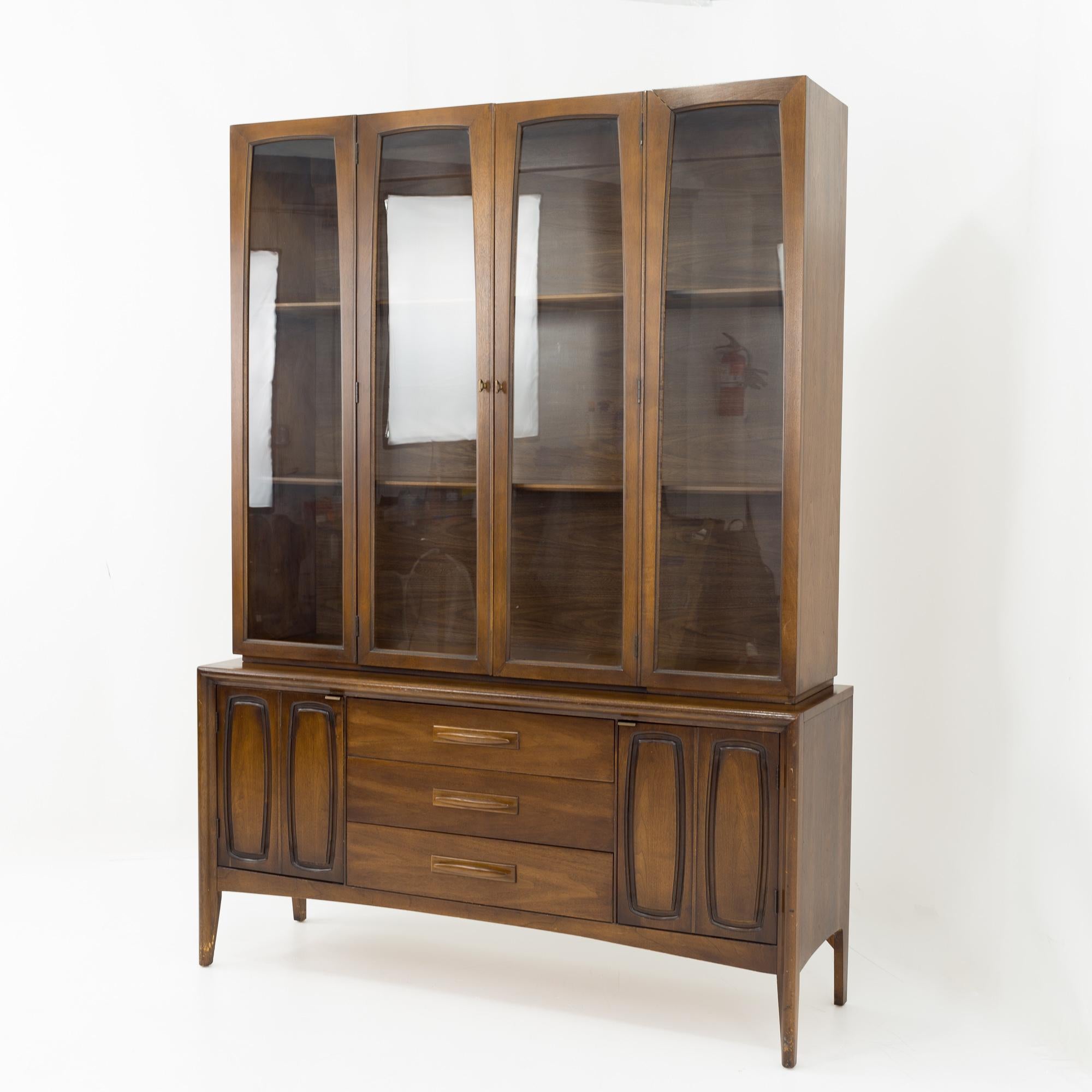 Broyhill emphasis mid century walnut china cabinet
This china cabinet measures: 53.25 wide x 13 deep x 76 inches high

All pieces of furniture can be had in what we call restored vintage condition. That means the piece is restored upon purchase