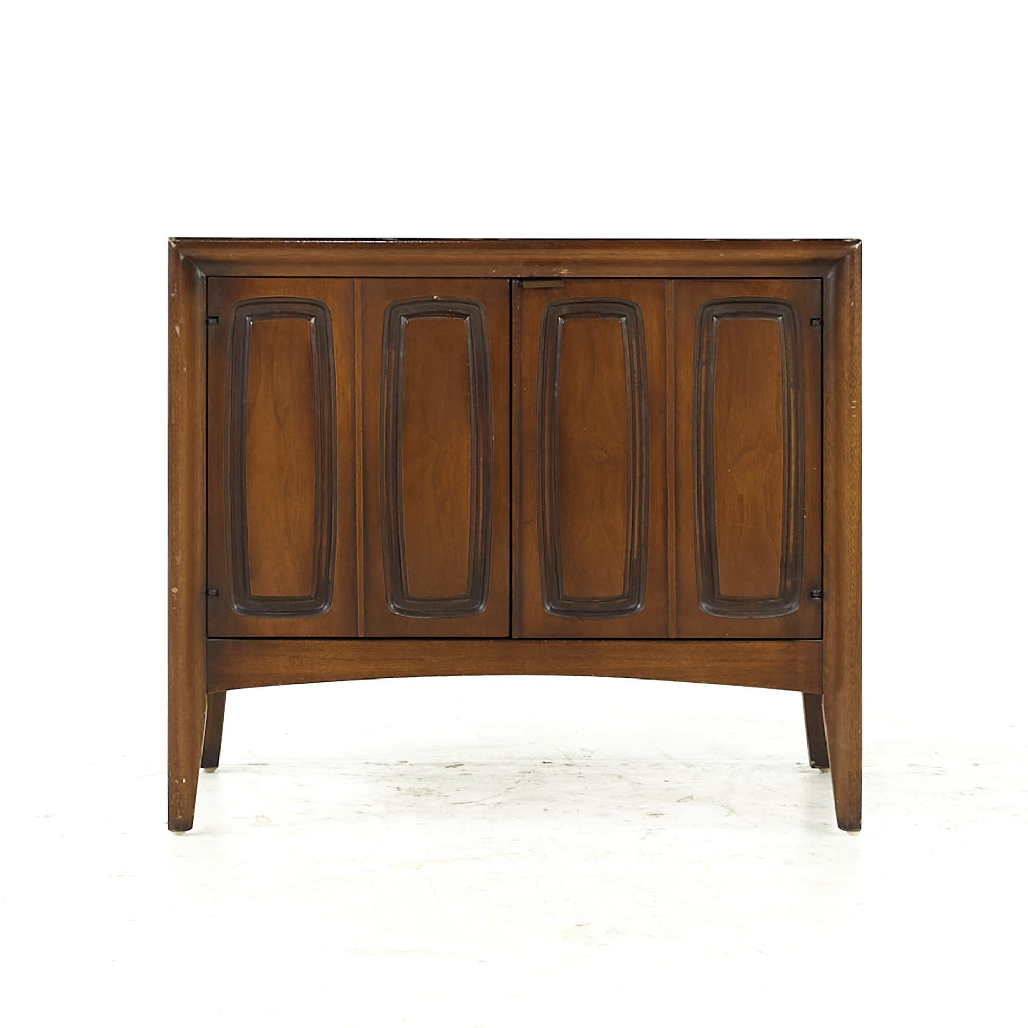 Broyhill Emphasis midcentury walnut nightstand

This nightstand measures: 26 wide x 18 deep x 22.5 inches high

All pieces of furniture can be had in what we call restored vintage condition. That means the piece is restored upon purchase so it’s