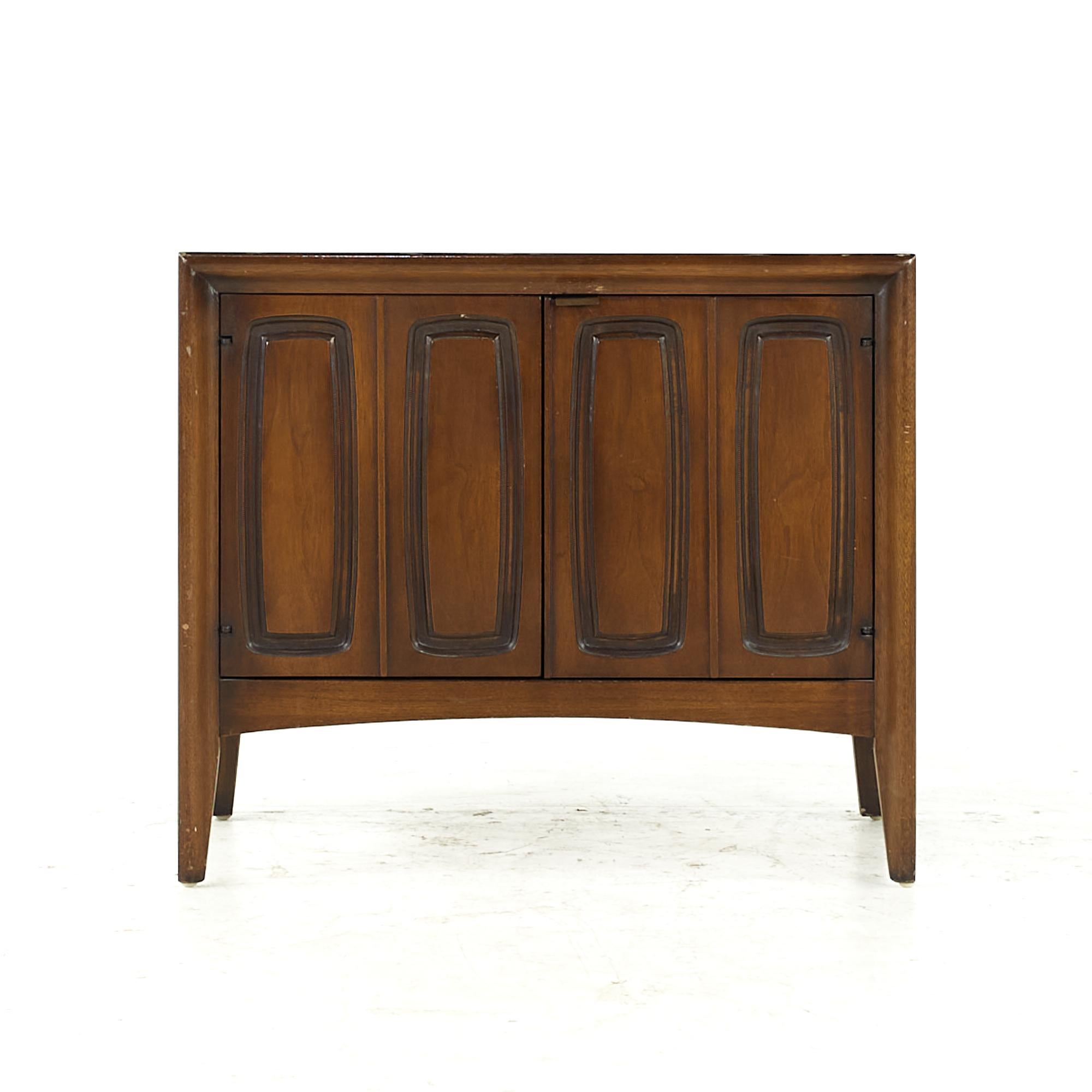 Broyhill Emphasis midcentury walnut nightstand

This nightstand measures: 26 wide x 18 deep x 22.5 inches high

All pieces of furniture can be had in what we call restored vintage condition. That means the piece is restored upon purchase so it’s