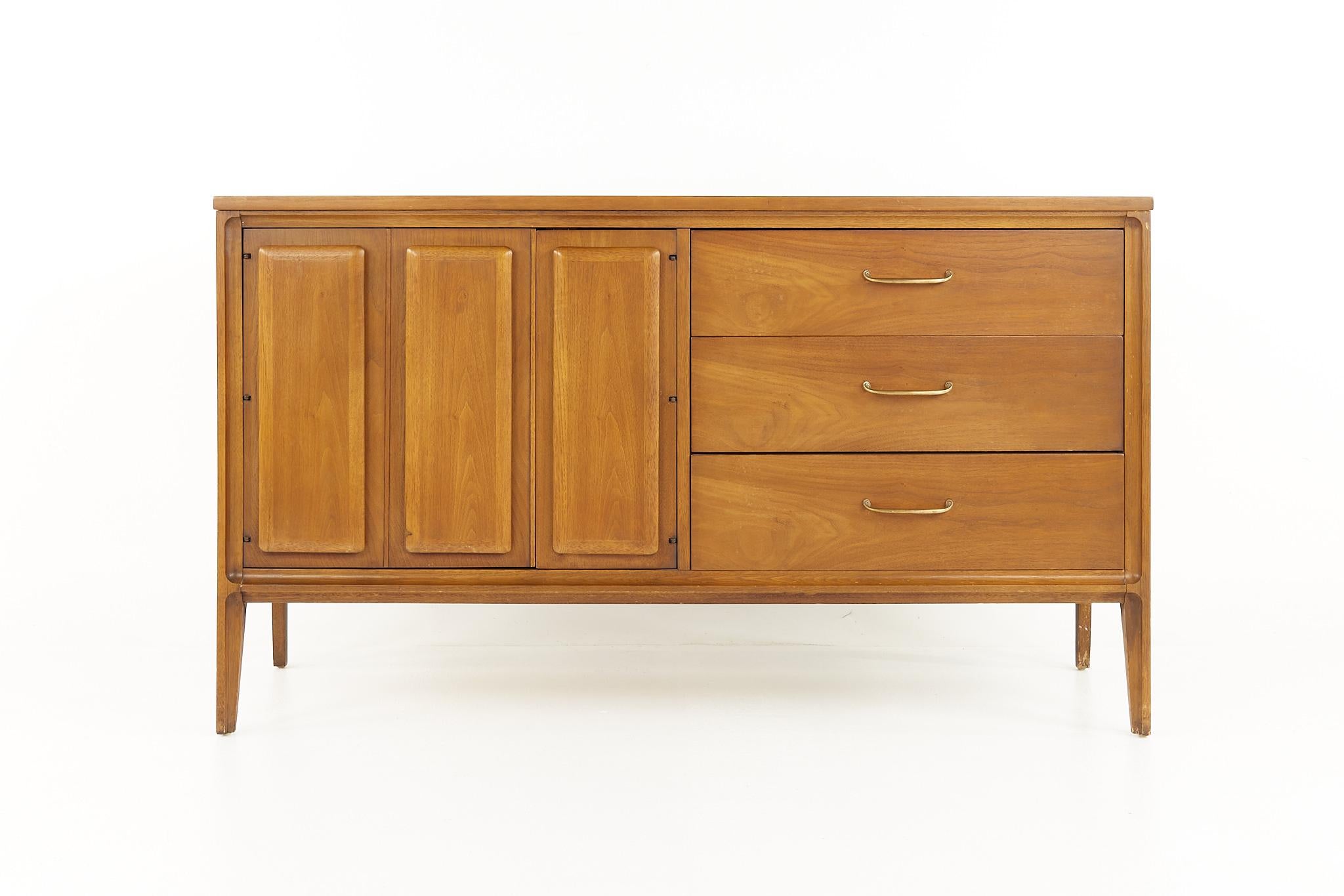 Broyhill Forward '70 mid century walnut sideboard credenza

This credenza measures: 54 wide x 18 deep x 31.5 inches high

All pieces of furniture can be had in what we call restored vintage condition. That means the piece is restored upon