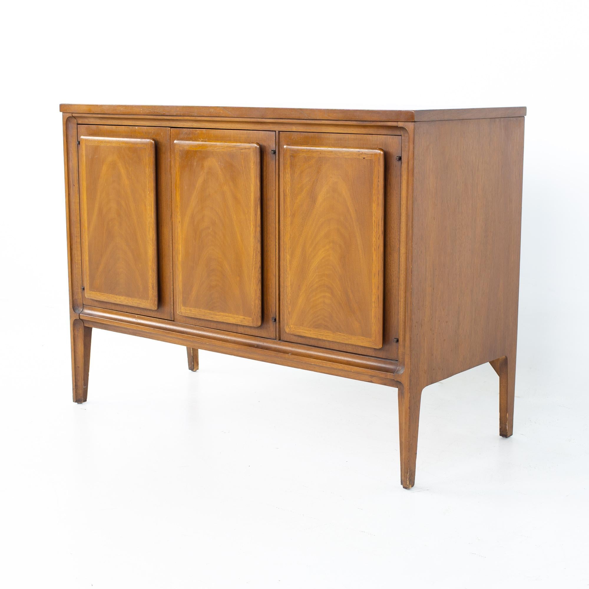 Broyhill Mid Century forward '70 small bar record cabinet credenza
Credenza measures: 38 wide x 17 deep x 28 inches high

All pieces of furniture can be had in what we call restored vintage condition. That means the piece is restored upon