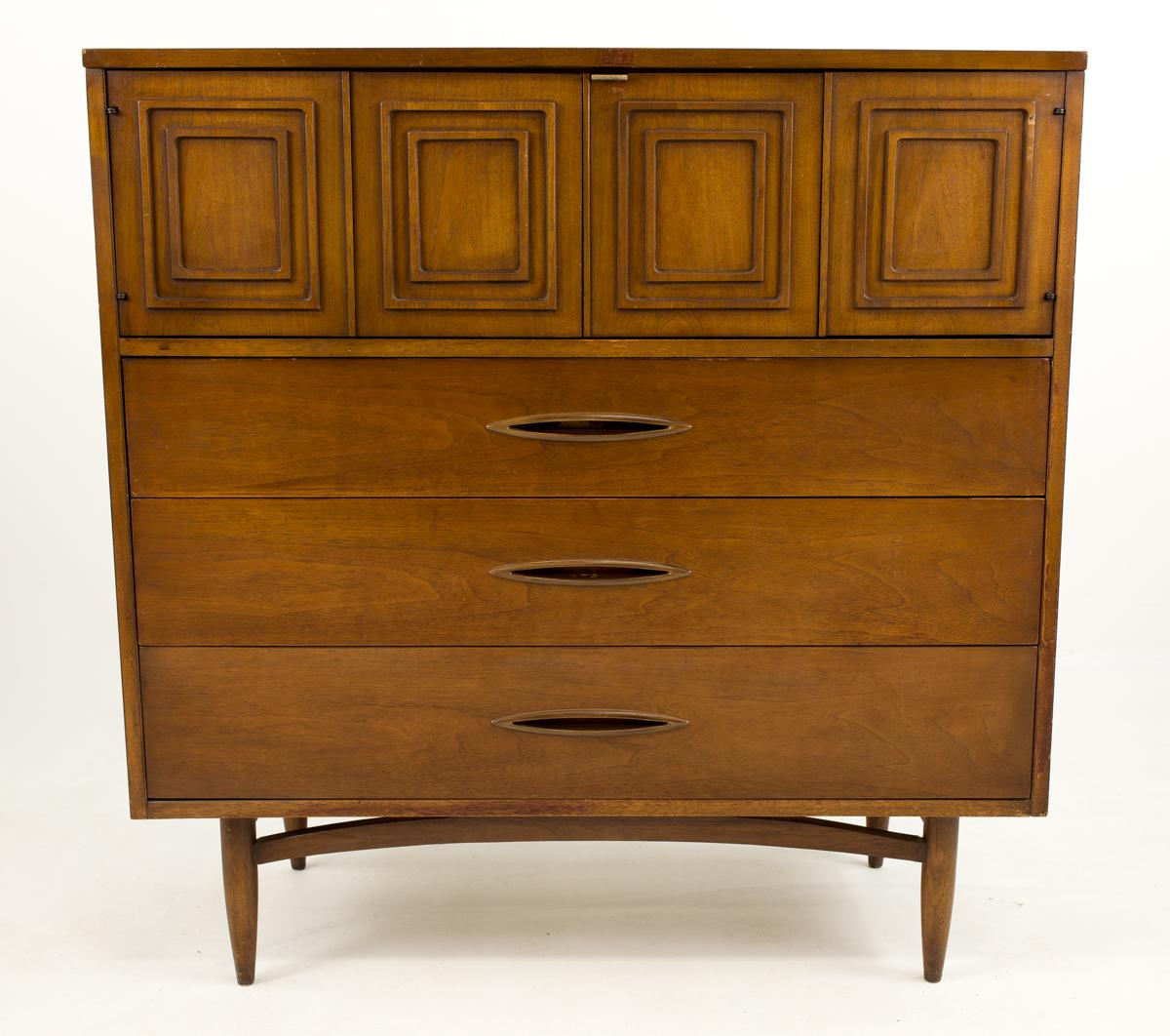 Broyhill Premier sculptra mid century highboy dresser

This dresser measures: 42 wide x 17 deep x 43 inches high

All pieces of furniture can be had in what we call restored vintage condition. That means the piece is restored upon purchase so