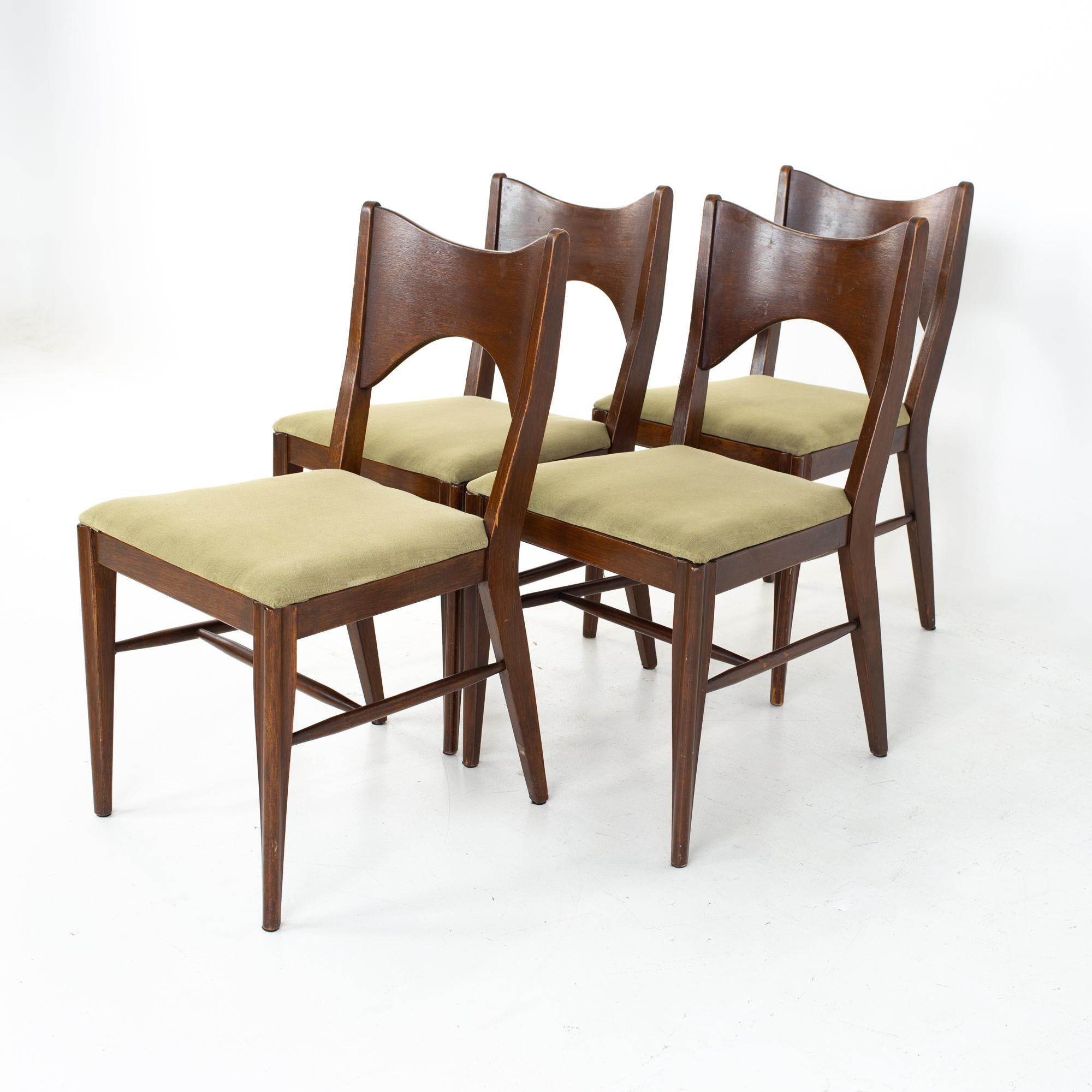 Broyhill Saga Mid Century dining chairs, set of 4
Each chair measures: 19.25 wide x 21.75 deep x 34 high, with a seat height of 18.25 and table clearance of 18.25

All pieces of furniture can be had in what we call restored vintage condition.