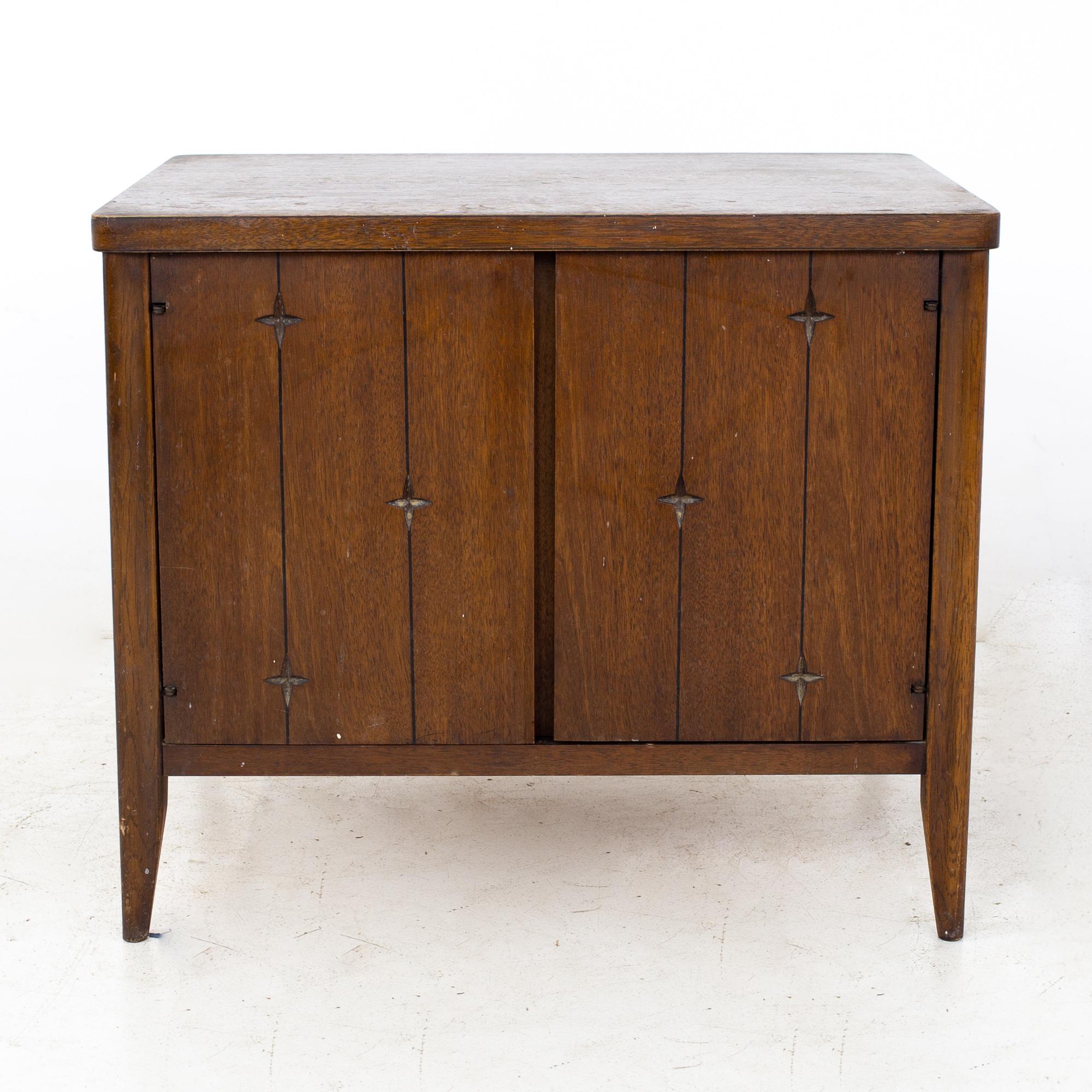 Broyhill saga mid century walnut commode nightstand
Nightstand measures: 26 wide x 20 deep x 22 inches high

All pieces of furniture can be had in what we call restored vintage condition. That means the piece is restored upon purchase so it’s