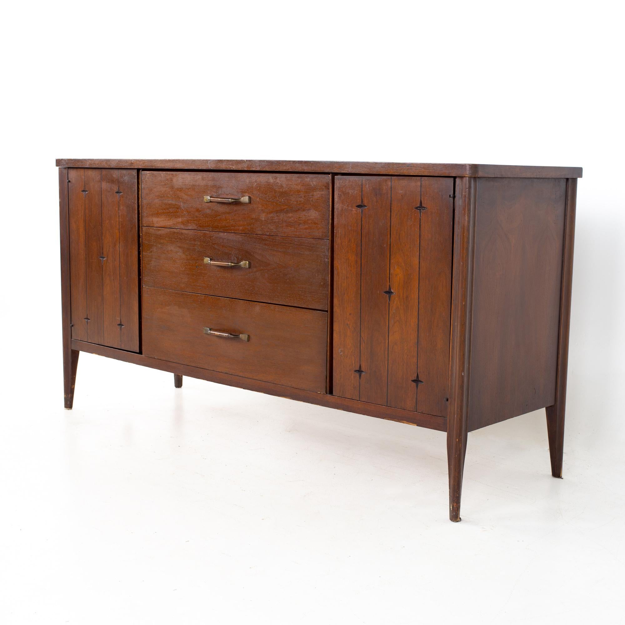 Broyhill Saga mid century walnut sideboard buffet credenza
Credenza measures: 60.75 wide x 19.25 deep x 31 inches high

All pieces of furniture can be had in what we call restored vintage condition. That means the piece is restored upon purchase