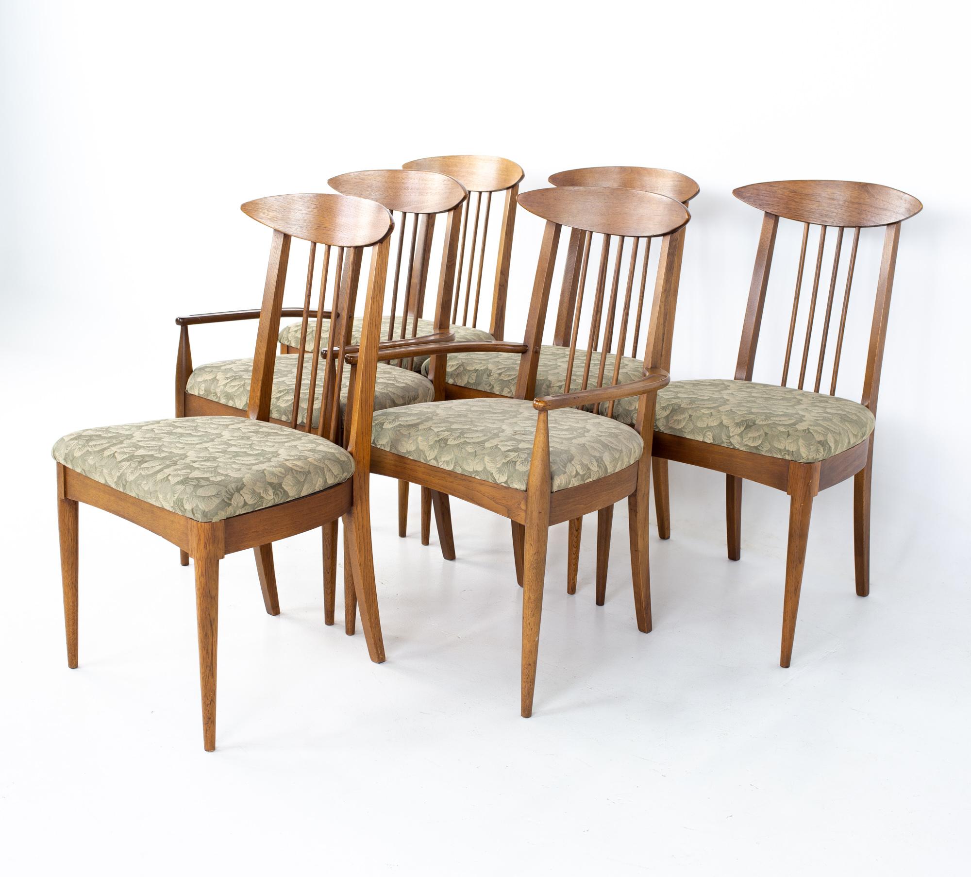 Broyhill sculptra brutalist mid century walnut cat's eye dining chairs - set of 6
Each chair measures: 21 wide x 20 deep x 36 high, with a seat height of 19 inches 

All pieces of furniture can be had in what we call restored vintage condition.