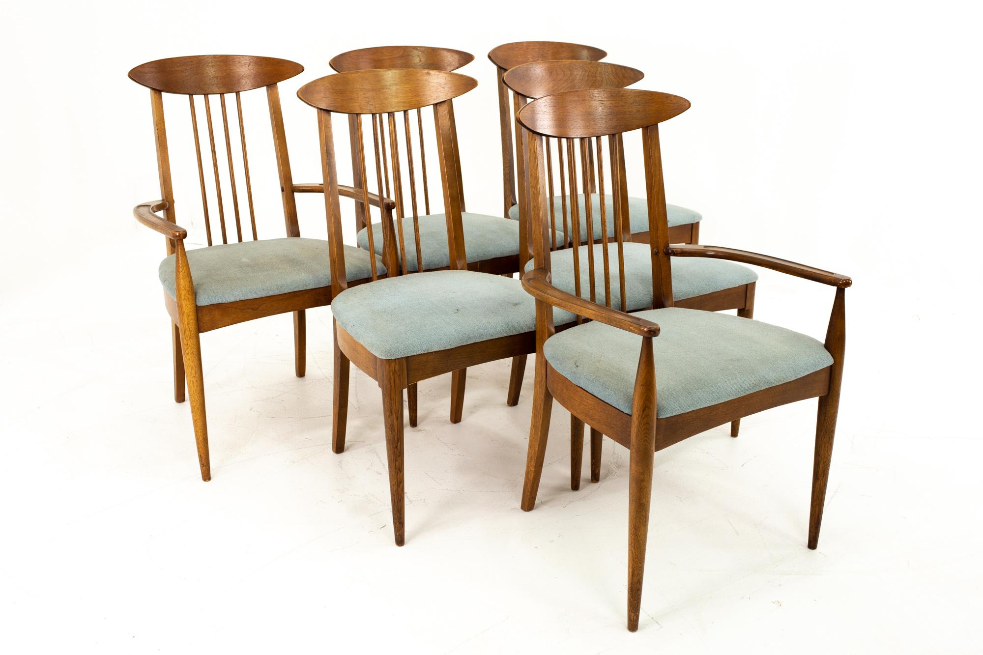 Broyhill Sculptra Mid Century Walnut Cat's Eye Dining Chairs - Set of 6

Each chair measures: 22.5 wide x 19 deep x 36 high with a seat height of 18 inches 

This price includes getting this piece in what we call Restored Vintage Condition. That