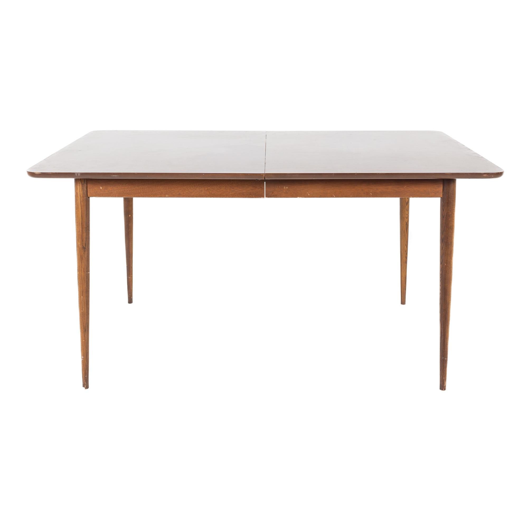 Broyhill style mid-century laminate top dining table

This table measures: 60 wide x 40 deep x 30 inches high, with a chair clearance of 25 inches

All pieces of furniture can be had in what we call restored vintage condition. That means the